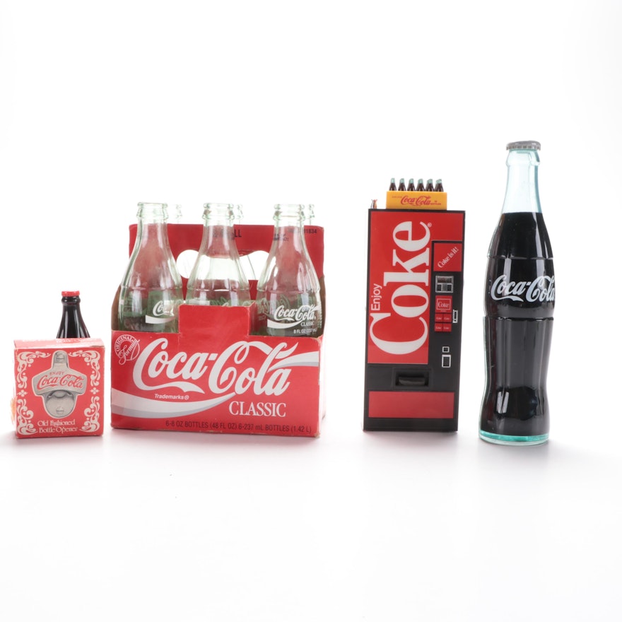 Coca-Cola Advertising Items Including 8oz Bottles, Radio, Stapler, and More
