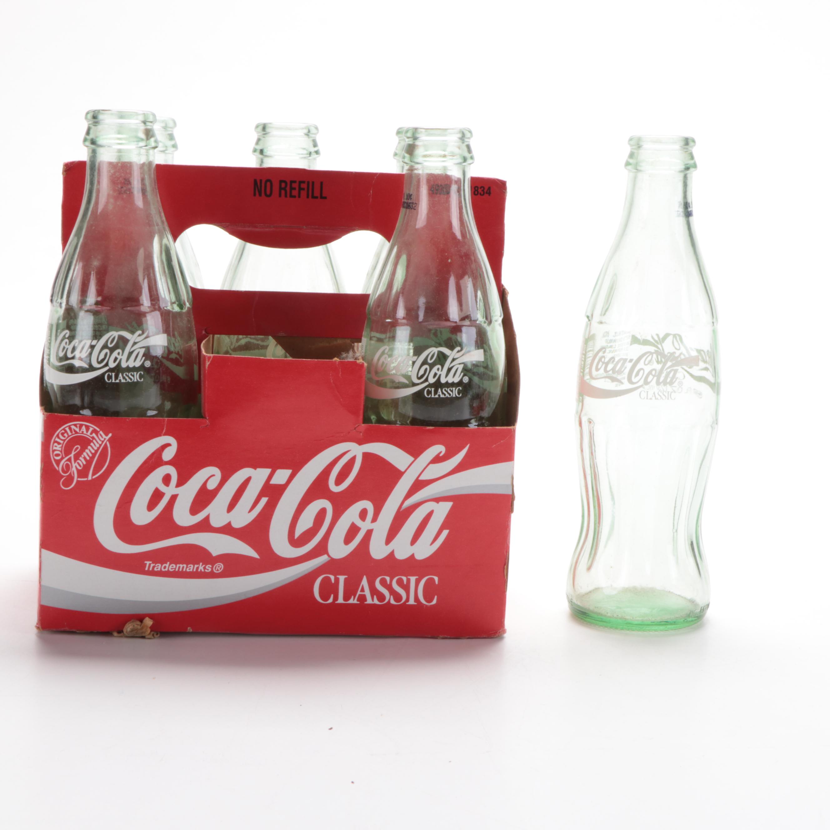 Coca-Cola Advertising Items Including 8oz Bottles, Radio, Stapler, and More