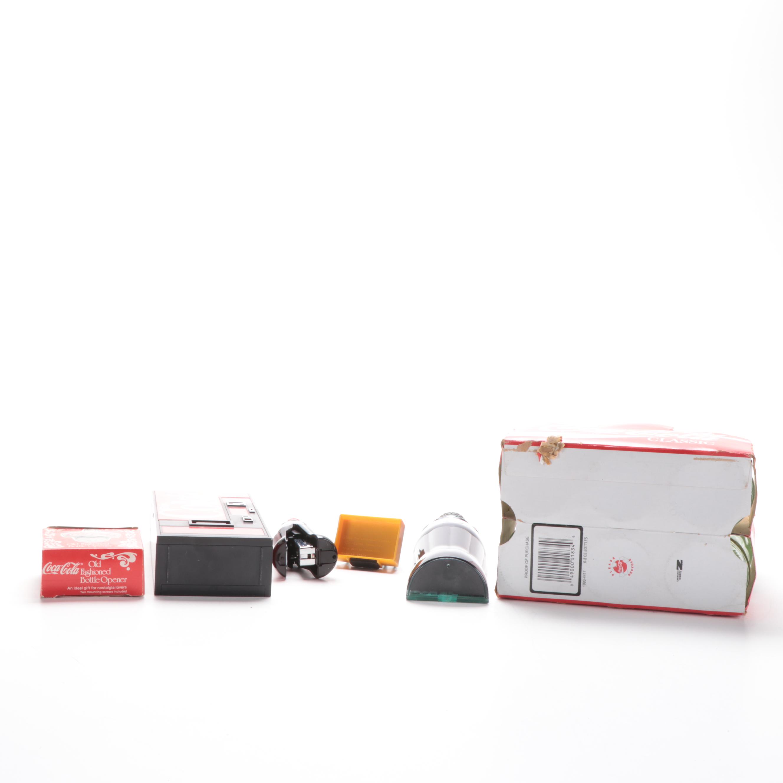 Coca-Cola Advertising Items Including 8oz Bottles, Radio, Stapler, and More