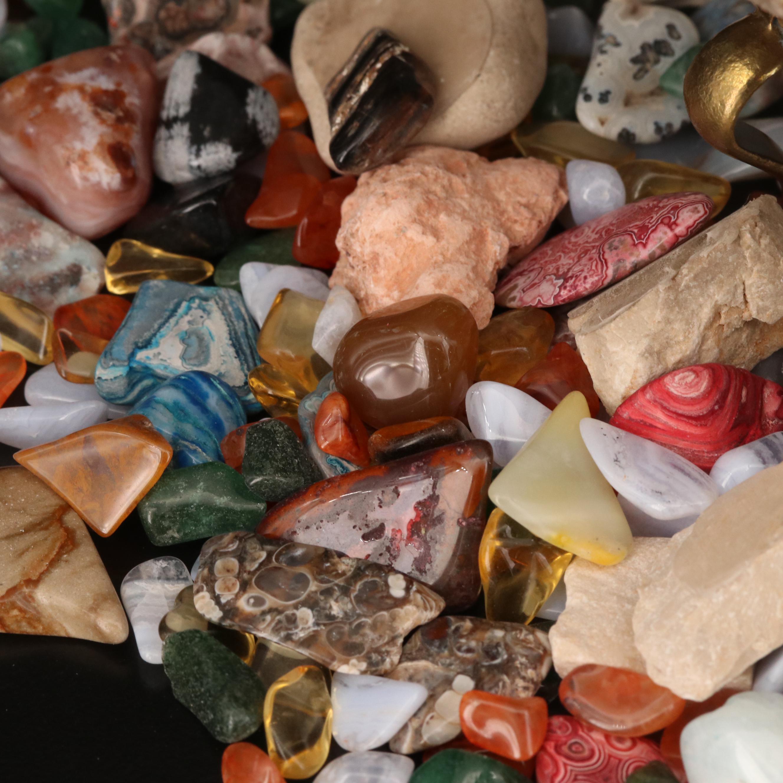 Polished and Rough Gemstones Including Tiger's Eye, Turquoise, Jasper, and More
