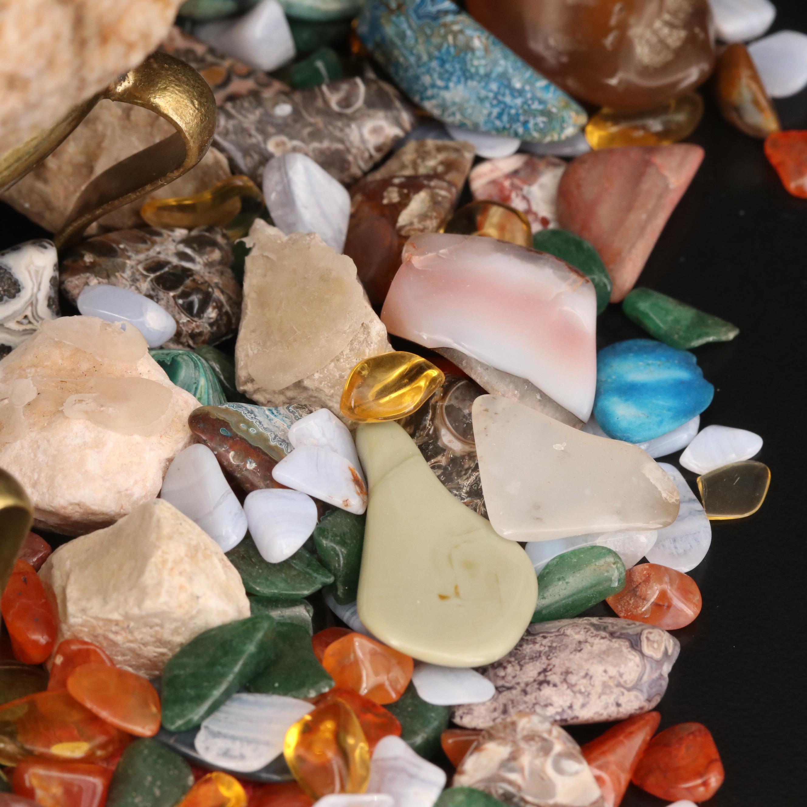 Polished and Rough Gemstones Including Tiger's Eye, Turquoise, Jasper, and More