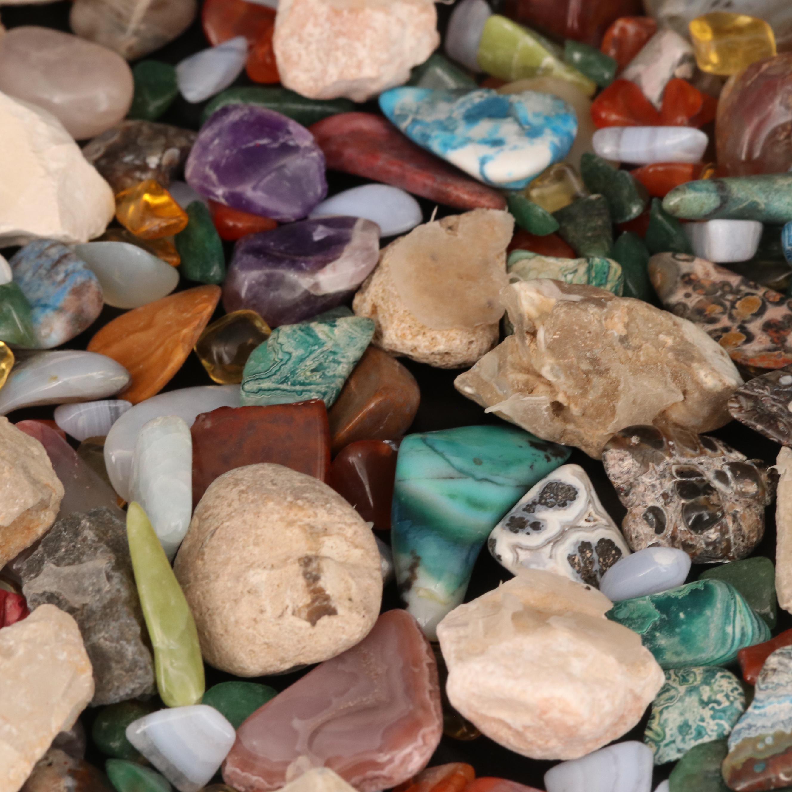Polished and Rough Gemstones Including Tiger's Eye, Turquoise, Jasper, and More