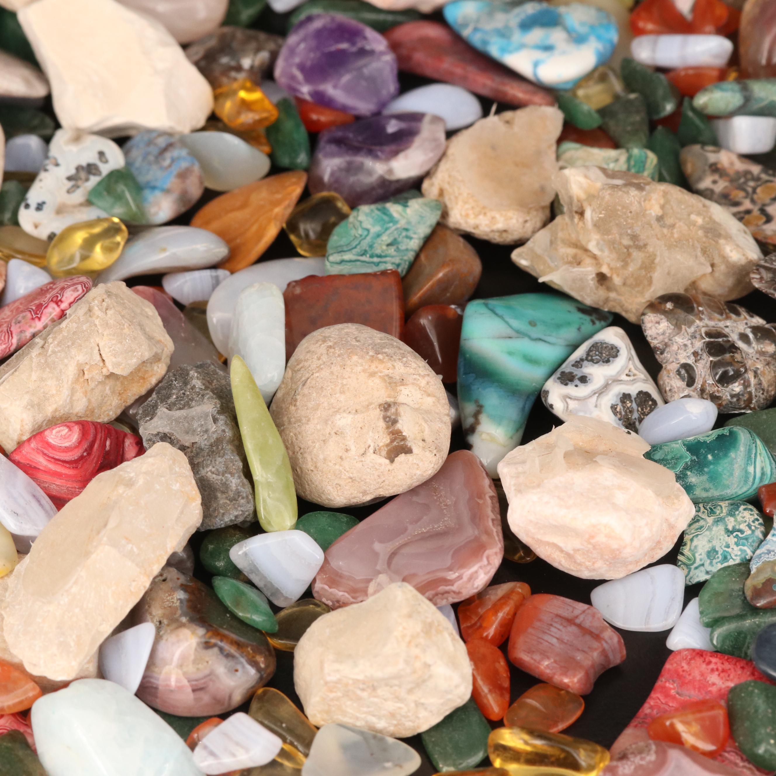 Polished and Rough Gemstones Including Tiger's Eye, Turquoise, Jasper, and More