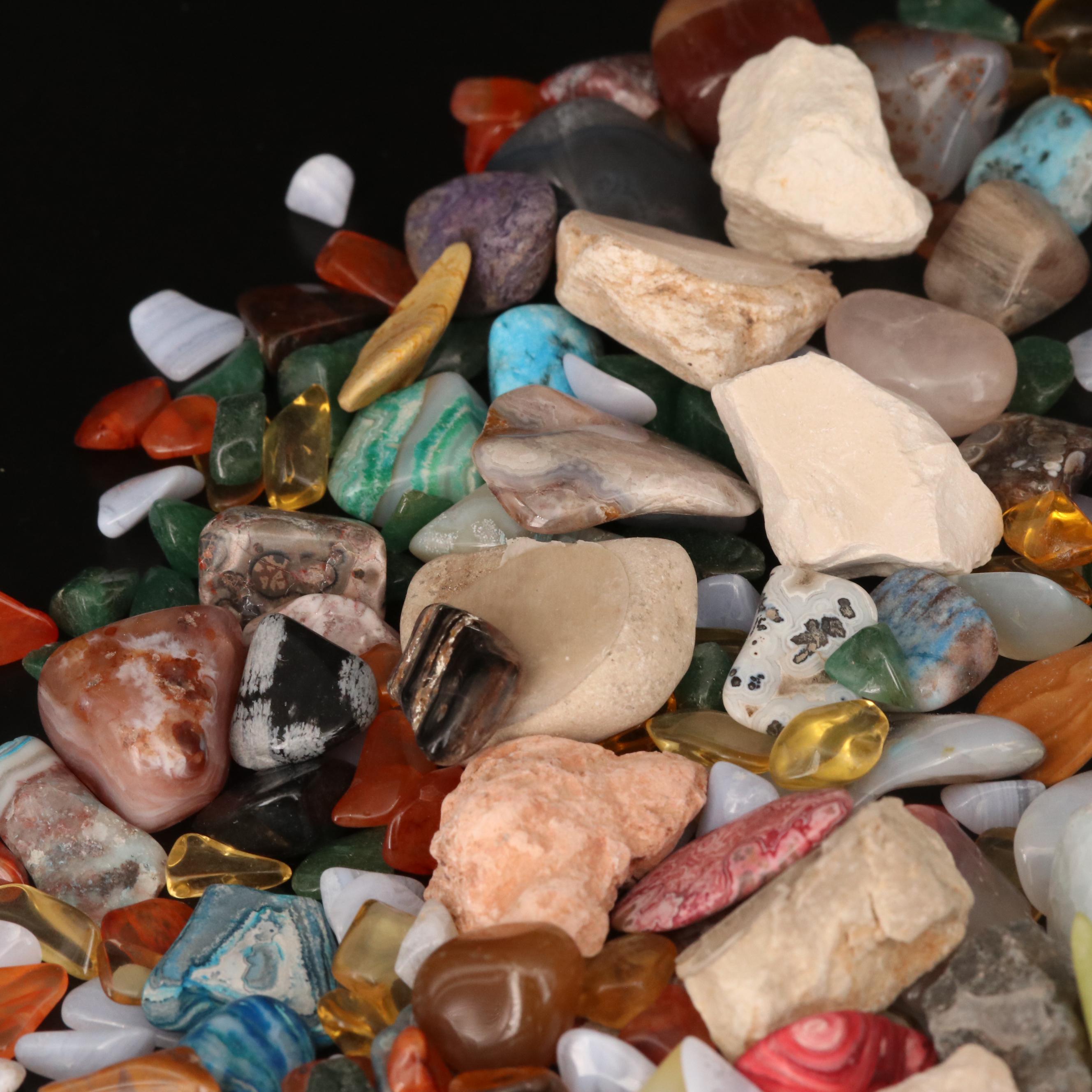 Polished and Rough Gemstones Including Tiger's Eye, Turquoise, Jasper, and More