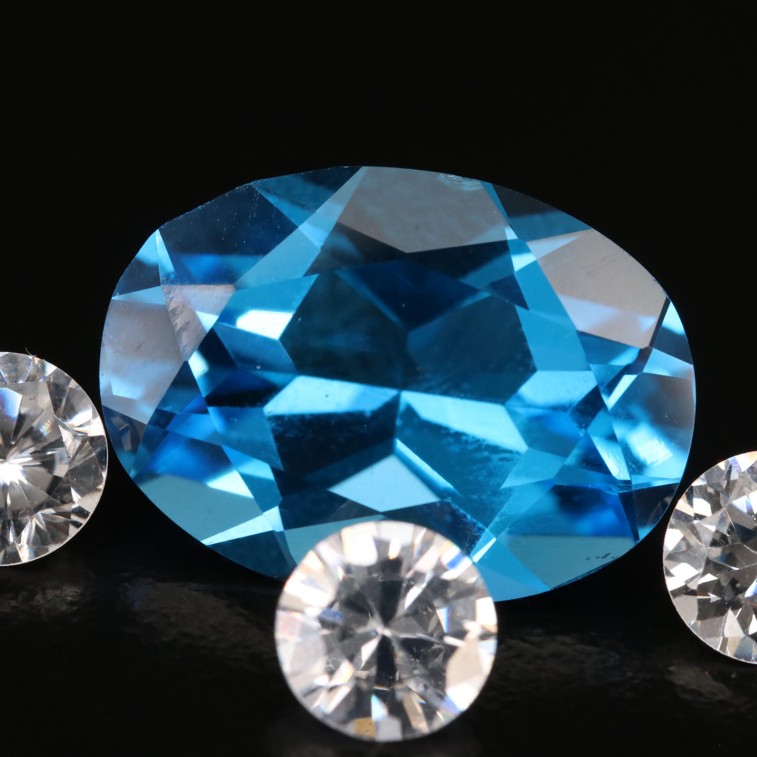 Loose Mixed Gemstones Including Topaz, Cubic Zirconia, Opal and Diamond