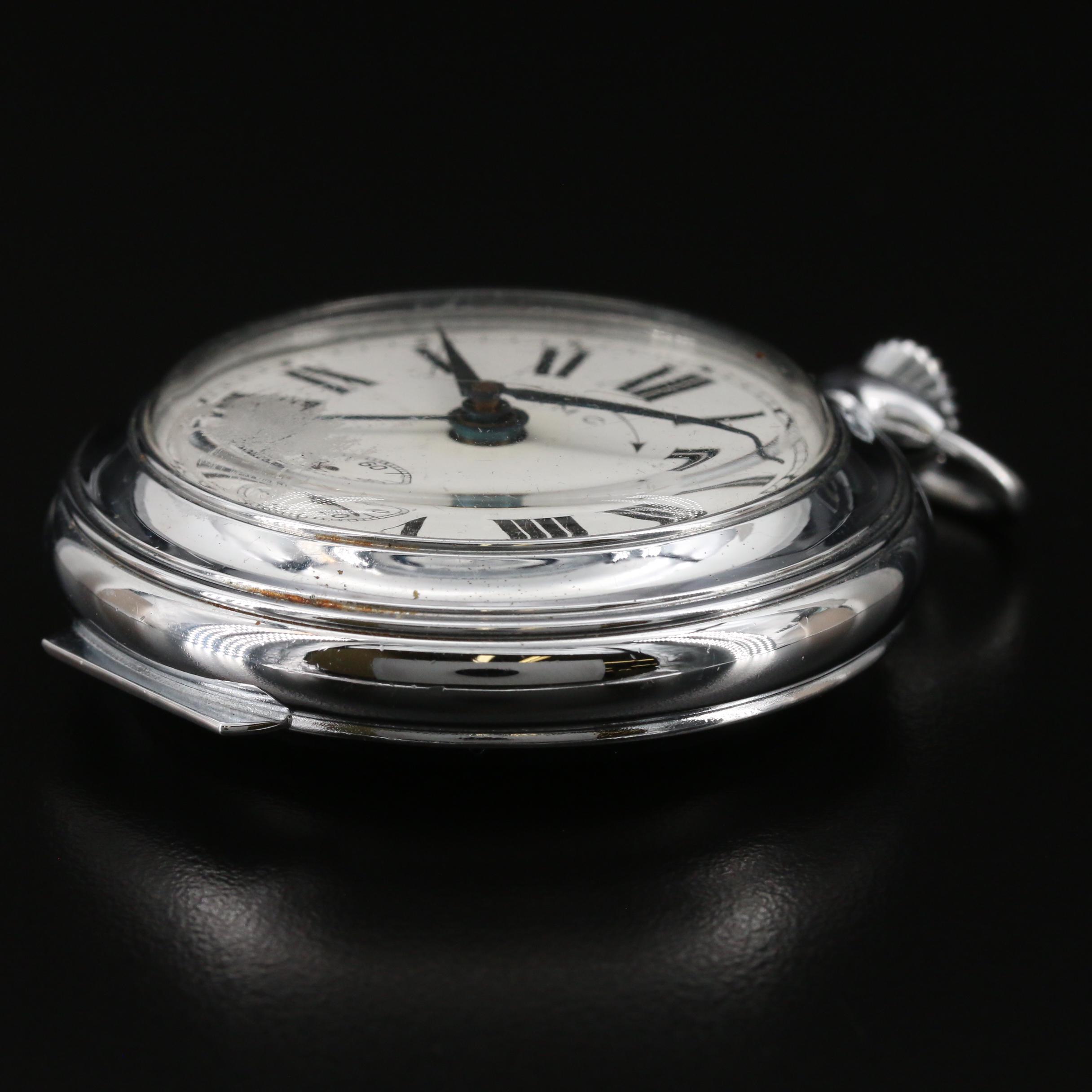 Vintage Swiss AMC Travel Alarm Clock