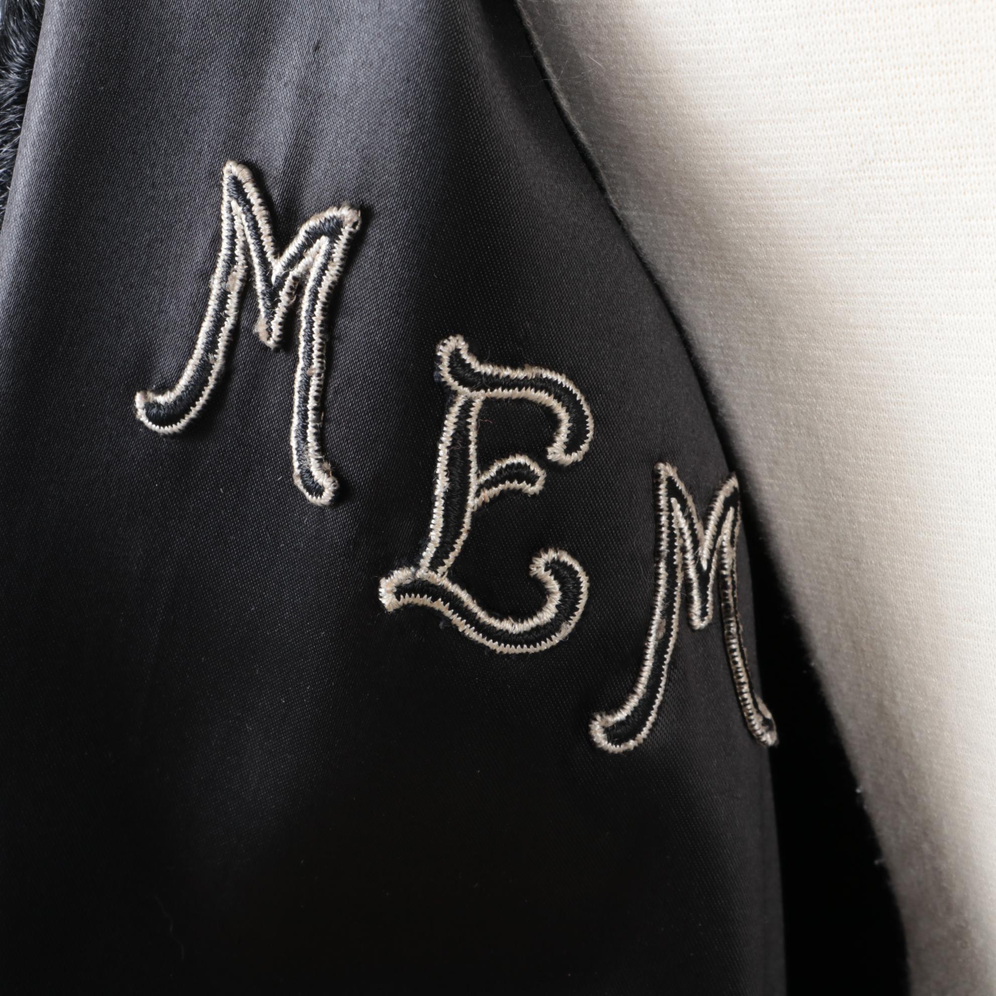 Black Broadtail Fur Coat with Bell Sleeves from Davidson's Indiana Fur Co.