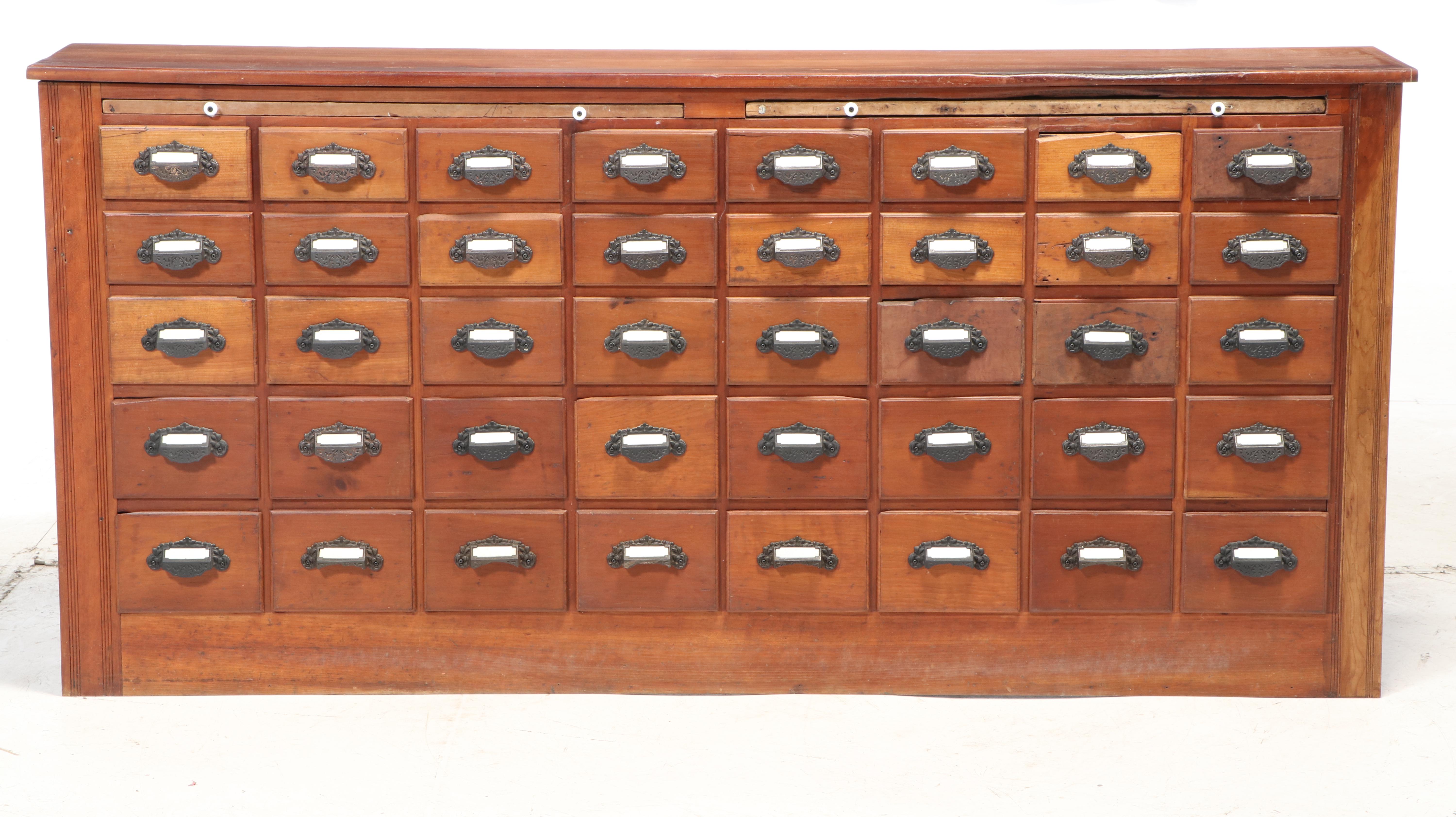 American Primitive Cherrywood Forty-Drawer Apothecary Cabinet, Late 19th Century