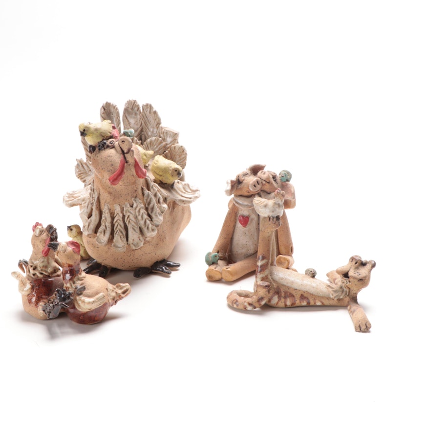 Four Whimsical Pottery Figurines