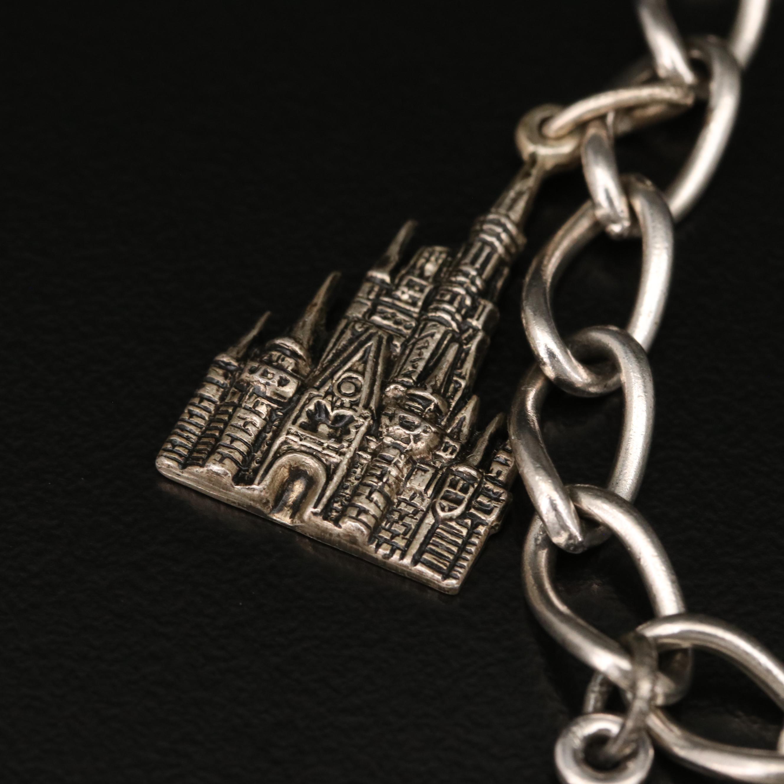 Rhinestone and Enamel Charm Bracelets Including 800 and Sterling Silver Charms