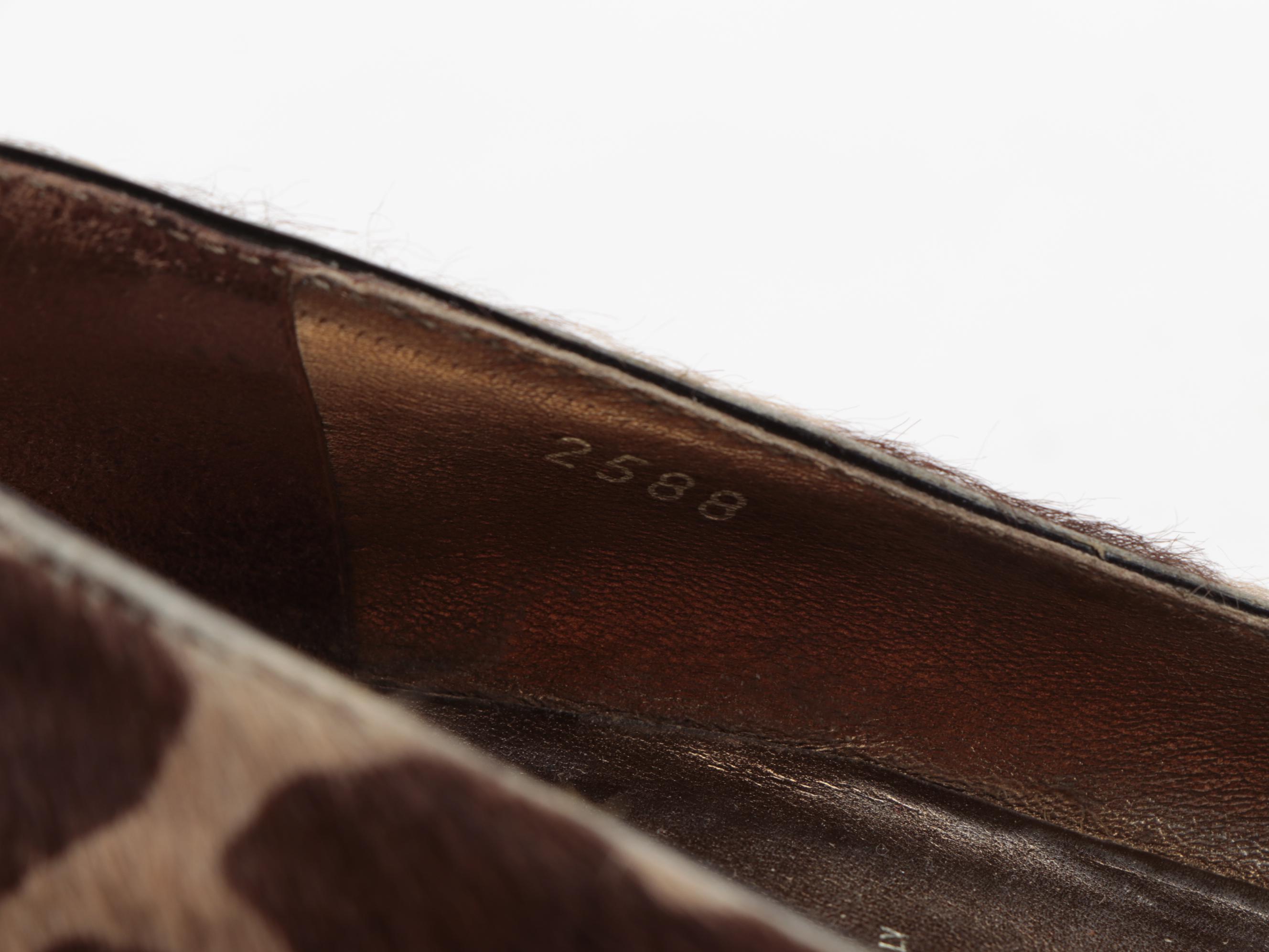 Prada Giraffe Print Calf Hair Pumps with Buckle Accents