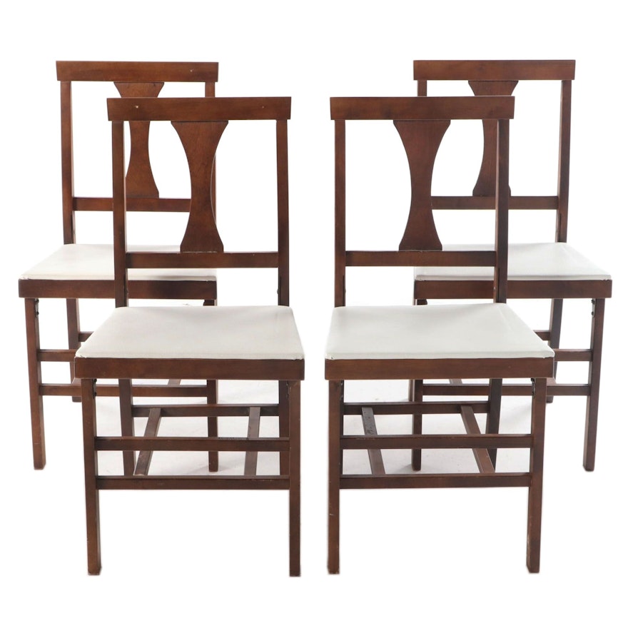 Four Mid Century Modern Walnut-Stained and White Vinyl Folding Side Chairs