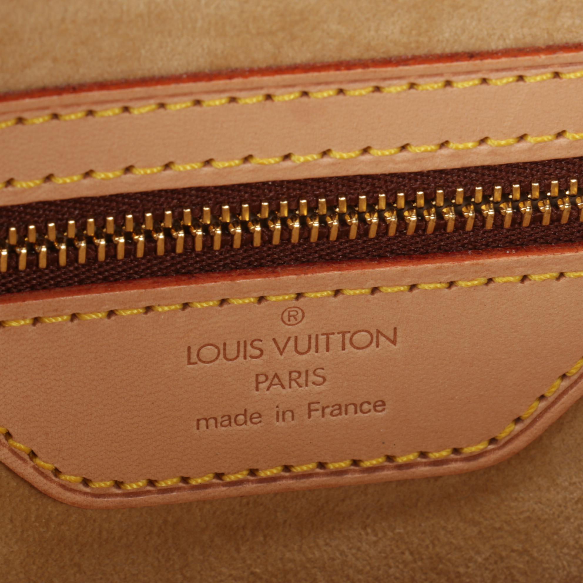 Louis Vuitton Rivoli Briefcase in Monogram Canvas and Vachetta Leather