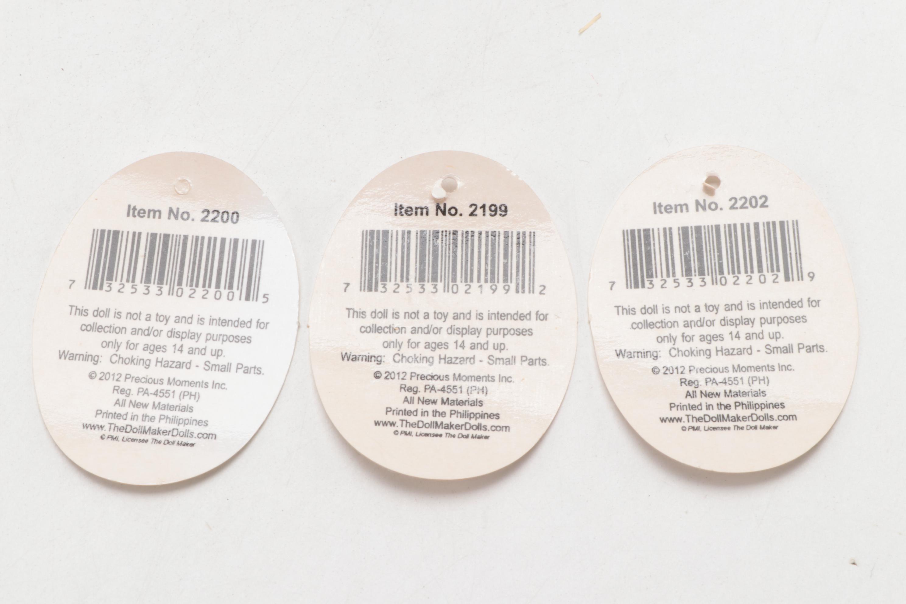 Precious Moments "The Wizard of Oz" Scarecrow, Tin Man and Lion Dolls