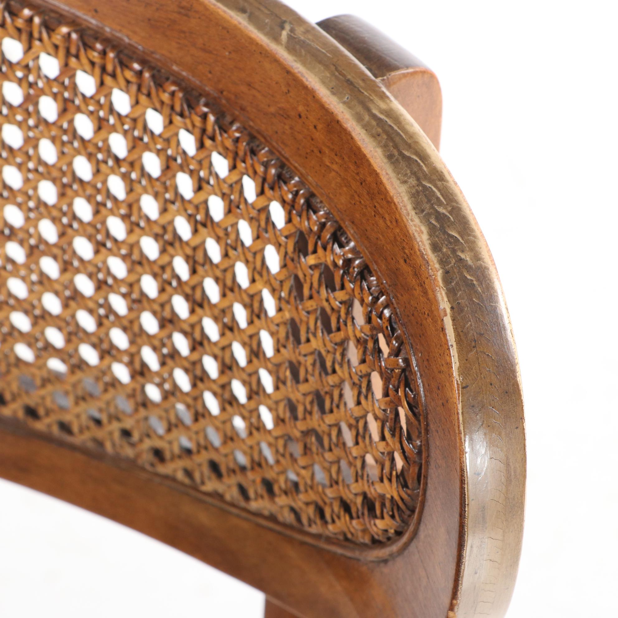 Four Mid Century Modern Walnut-Stained and Cane-Back Dining Side Chairs