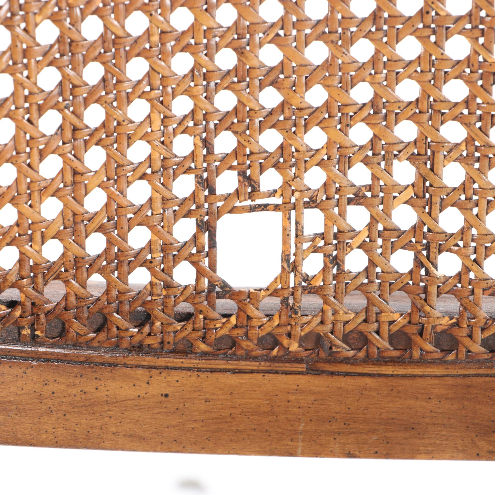 Four Mid Century Modern Walnut-Stained and Cane-Back Dining Side Chairs