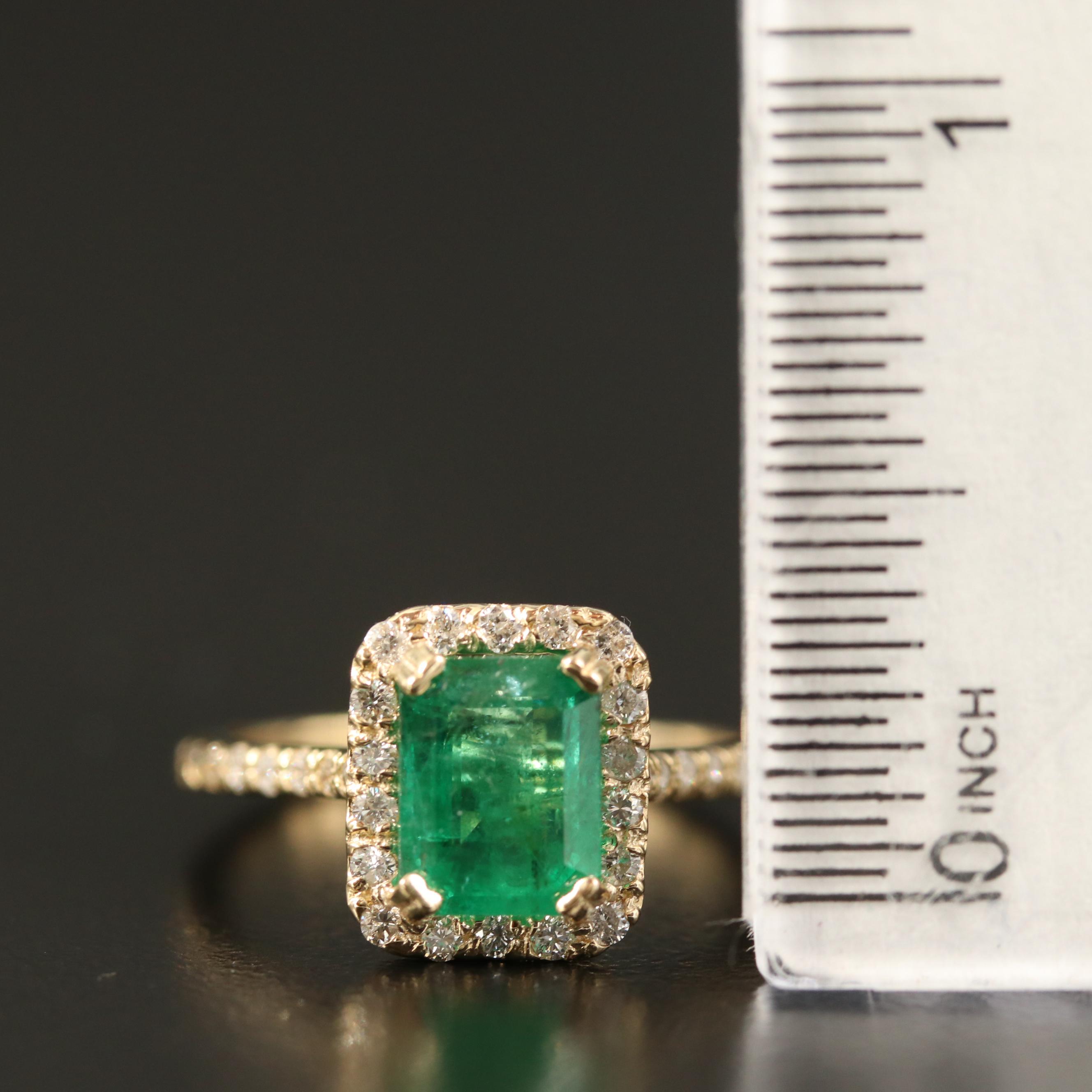 14K 1.85 CT Emerald and Diamond Halo Ring