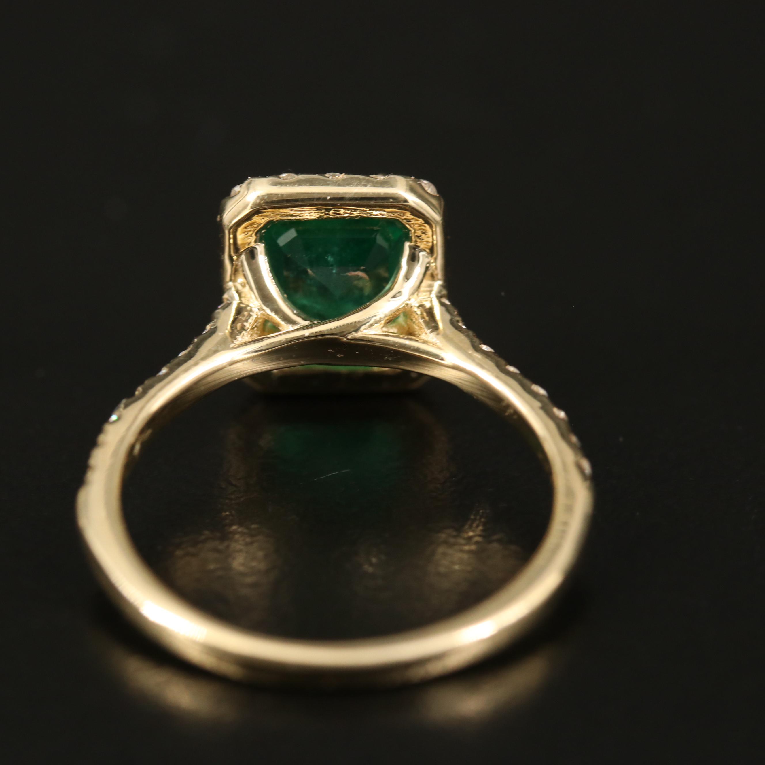 14K 1.85 CT Emerald and Diamond Halo Ring