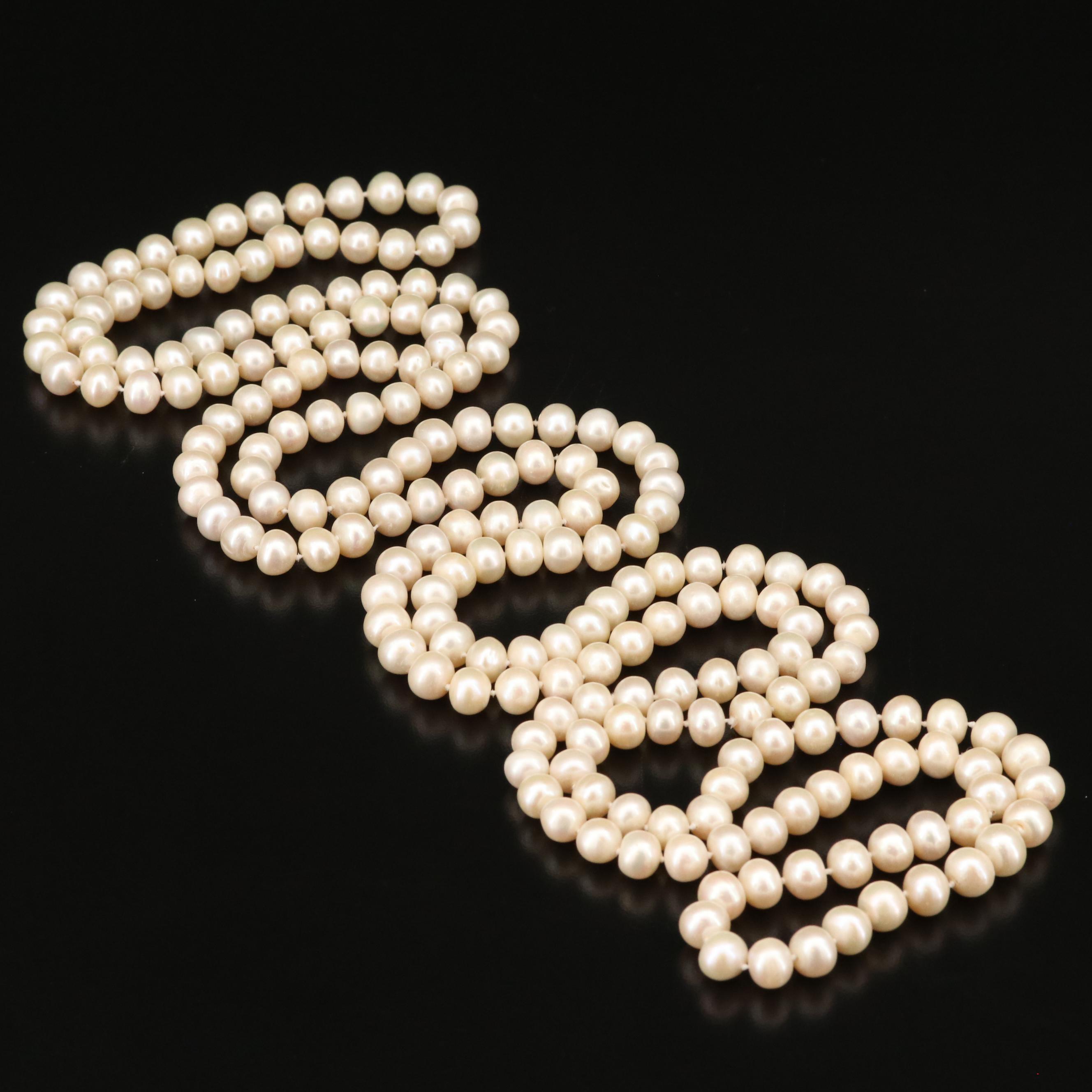 Rope Length Strand of Knotted Pearls