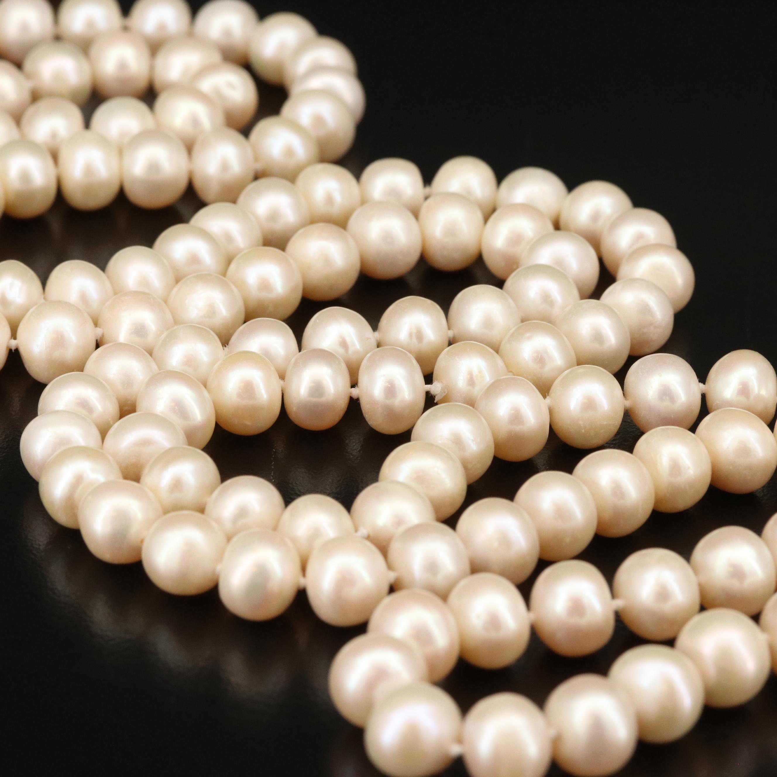 Rope Length Strand of Knotted Pearls