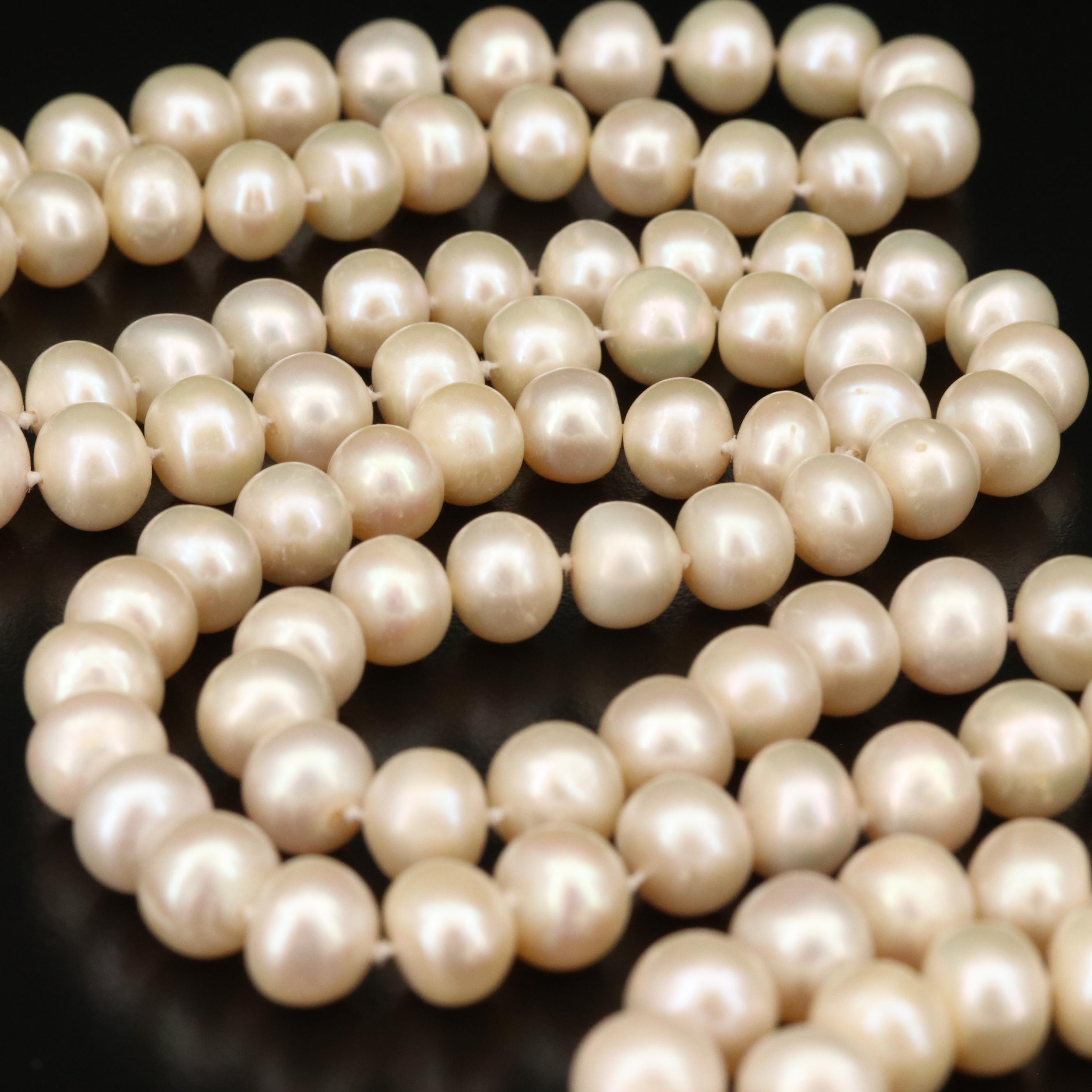 Rope Length Strand of Knotted Pearls