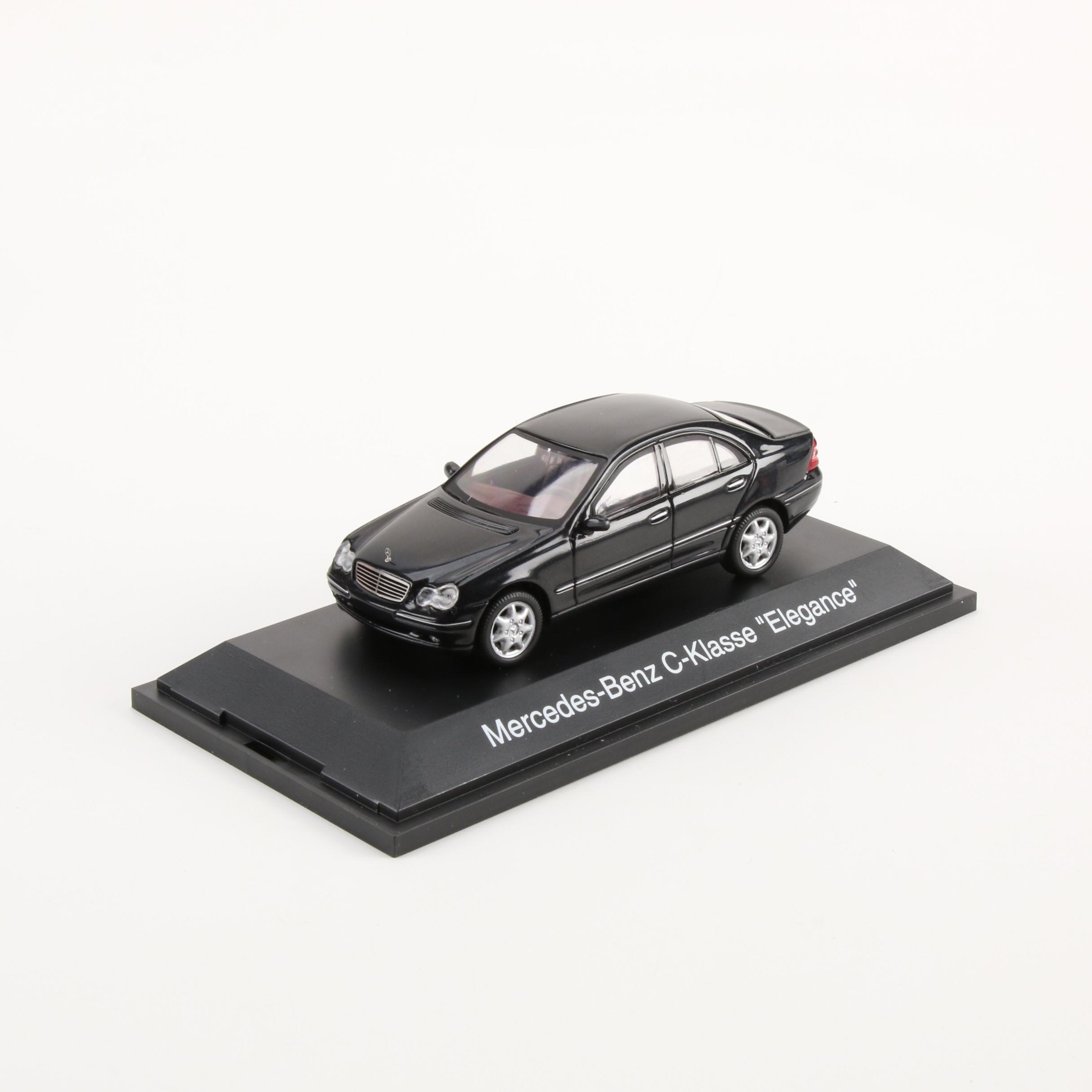 Schuco Die Cast Vehicles Including Rover 75, Cabrio, Mercedes V 230, and More