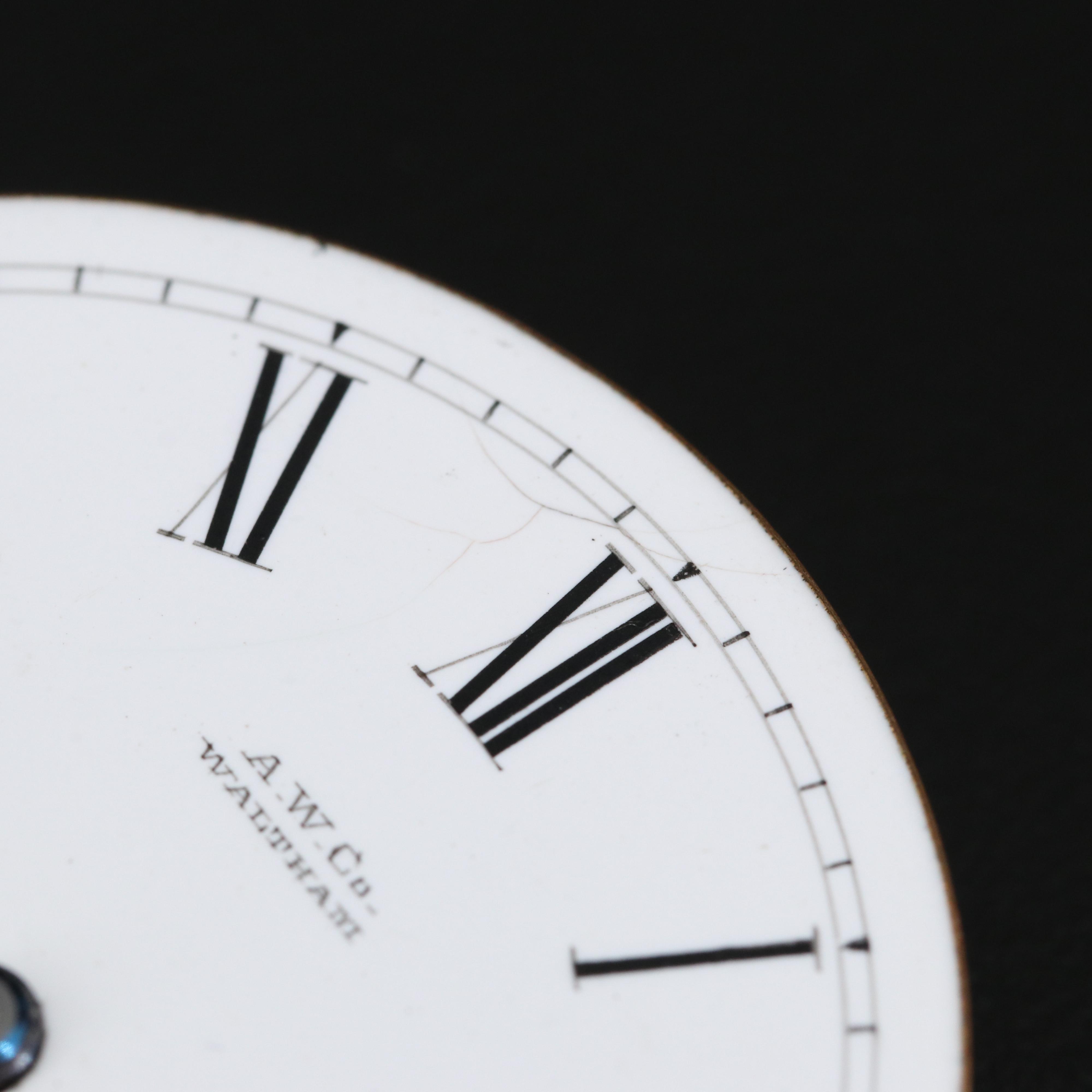 Three Pocket Watch Movements with Dials and Hands