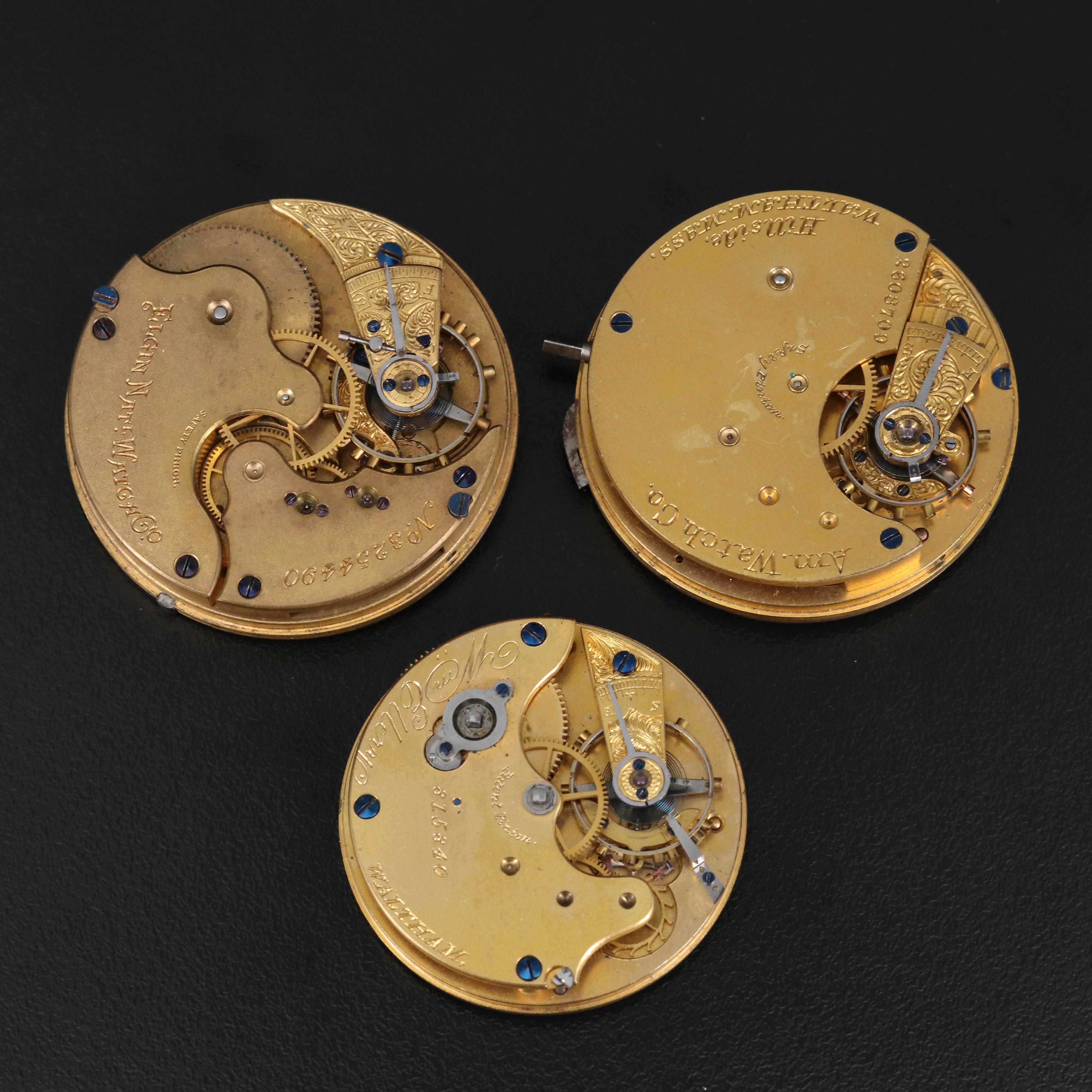 Three Pocket Watch Movements with Dials and Hands