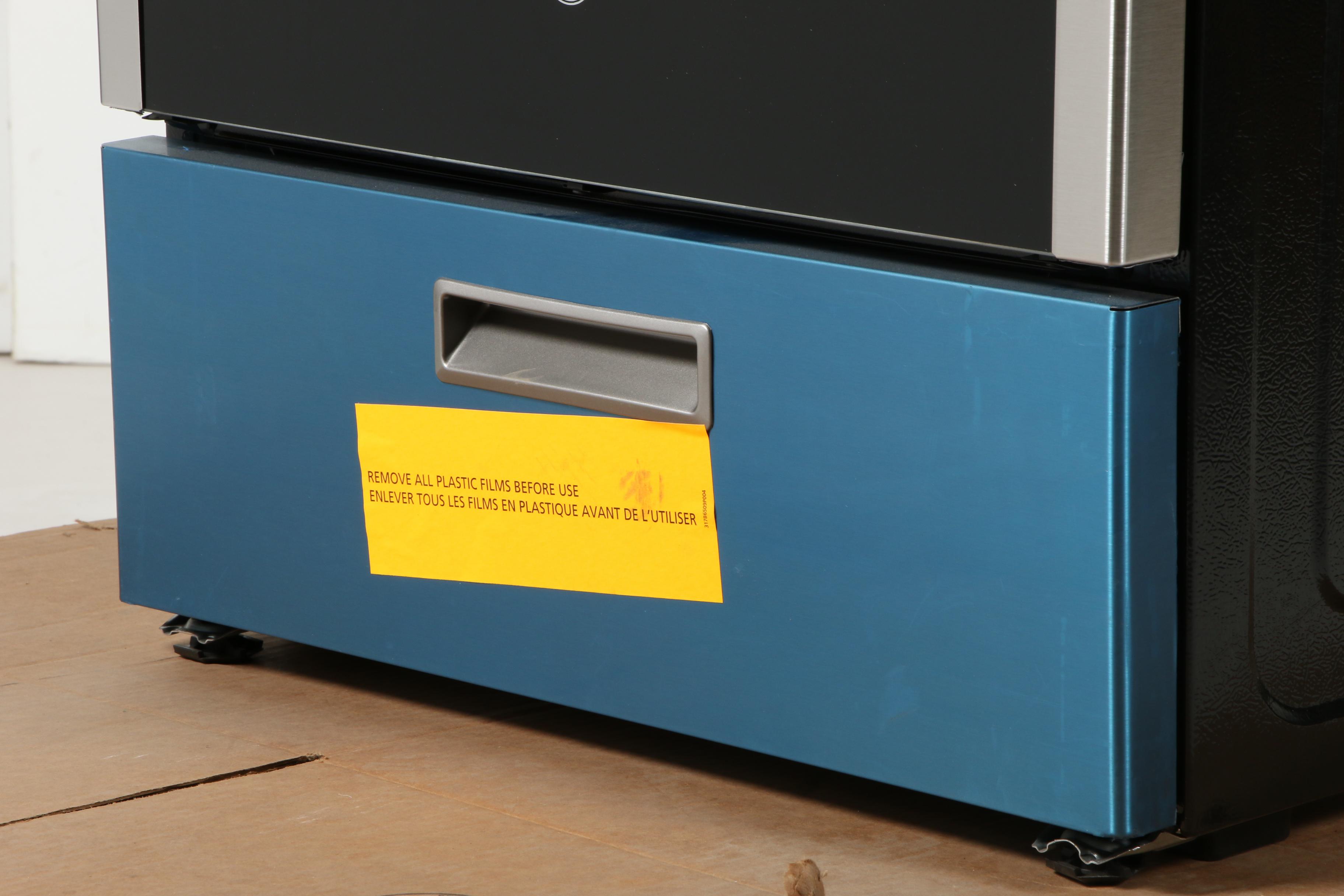 GE Stainless Steel 24" 2.9 Cu. Ft. Four-Burner Freestanding Gas Range