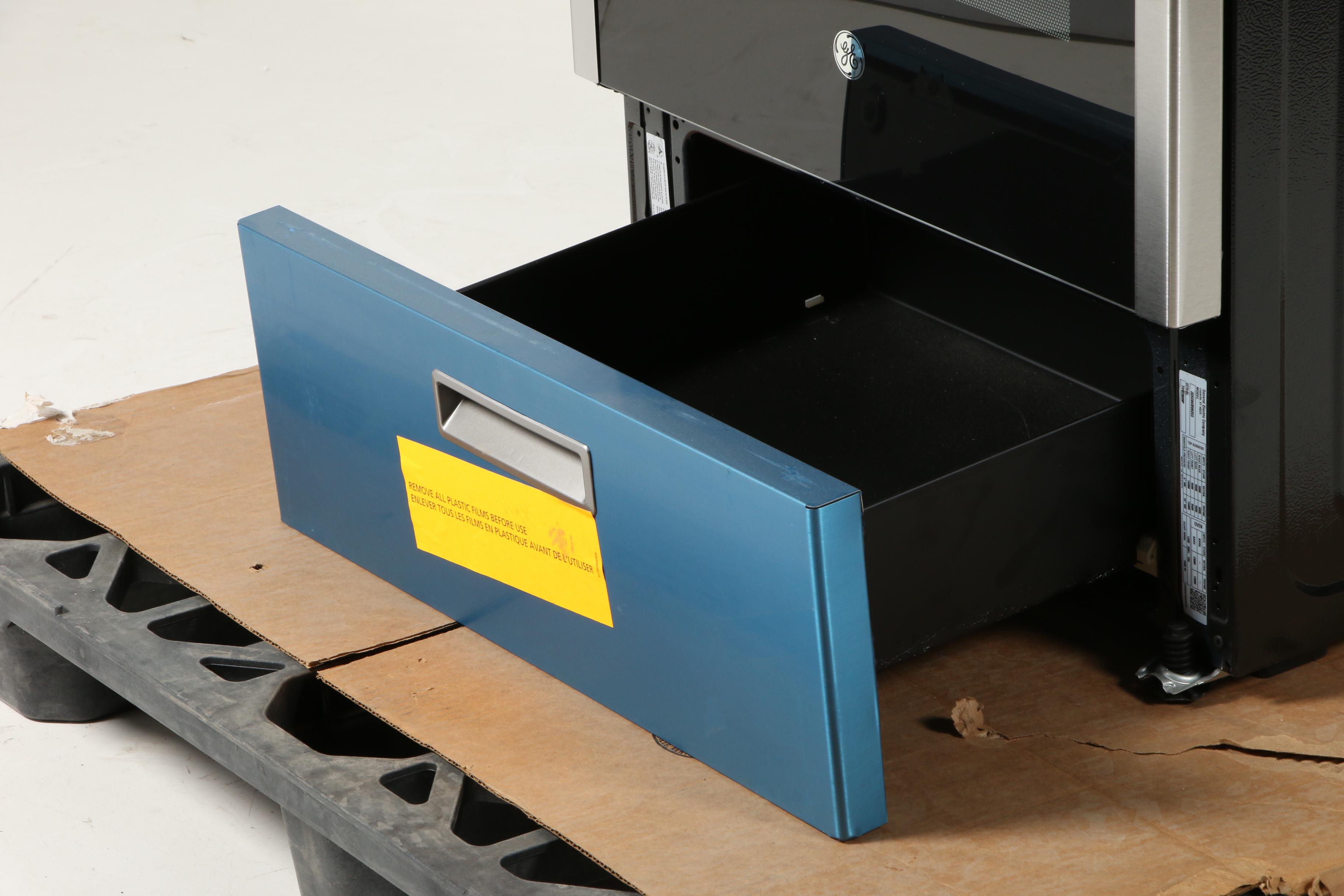 GE Stainless Steel 24" 2.9 Cu. Ft. Four-Burner Freestanding Gas Range