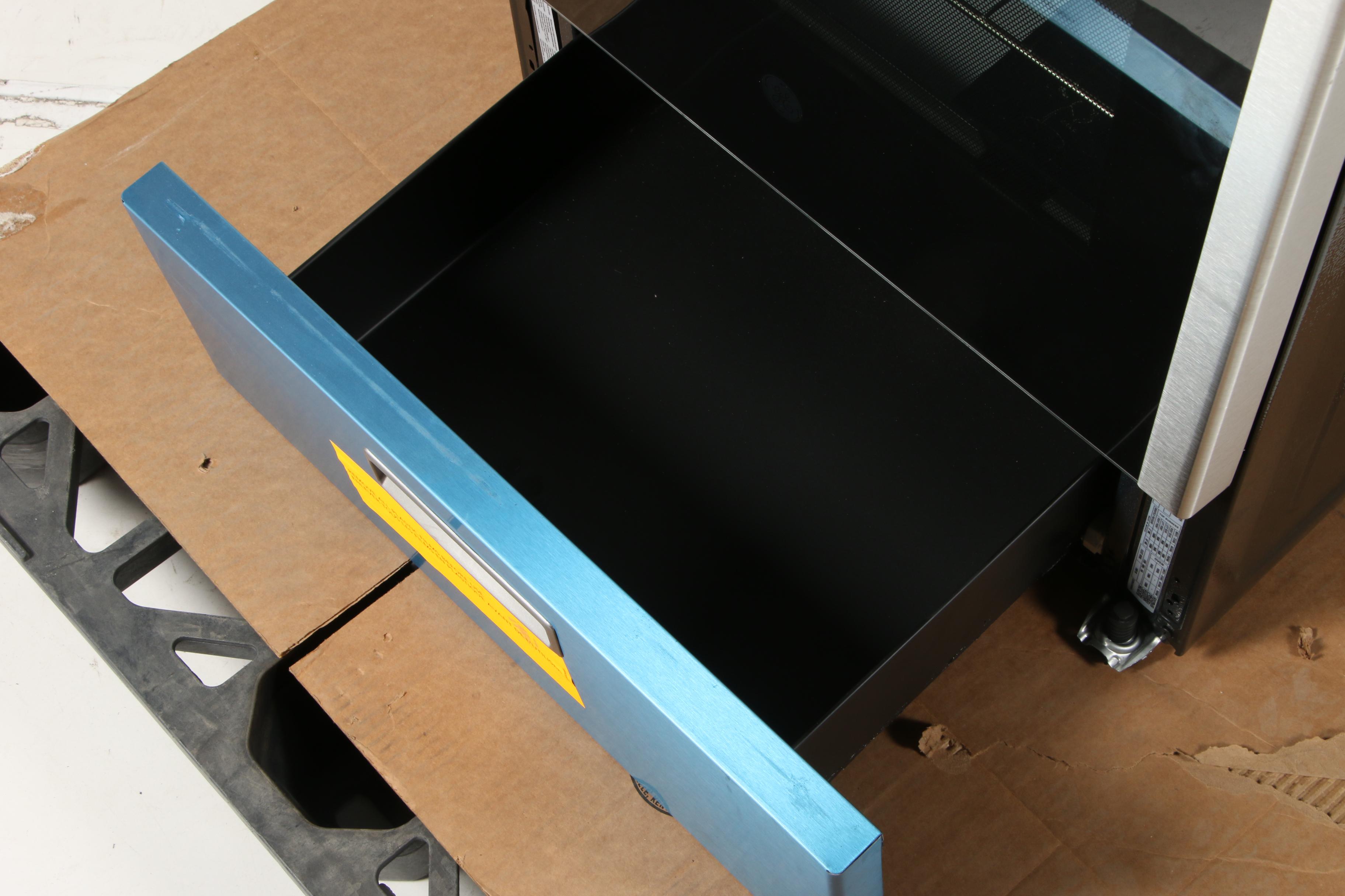 GE Stainless Steel 24" 2.9 Cu. Ft. Four-Burner Freestanding Gas Range