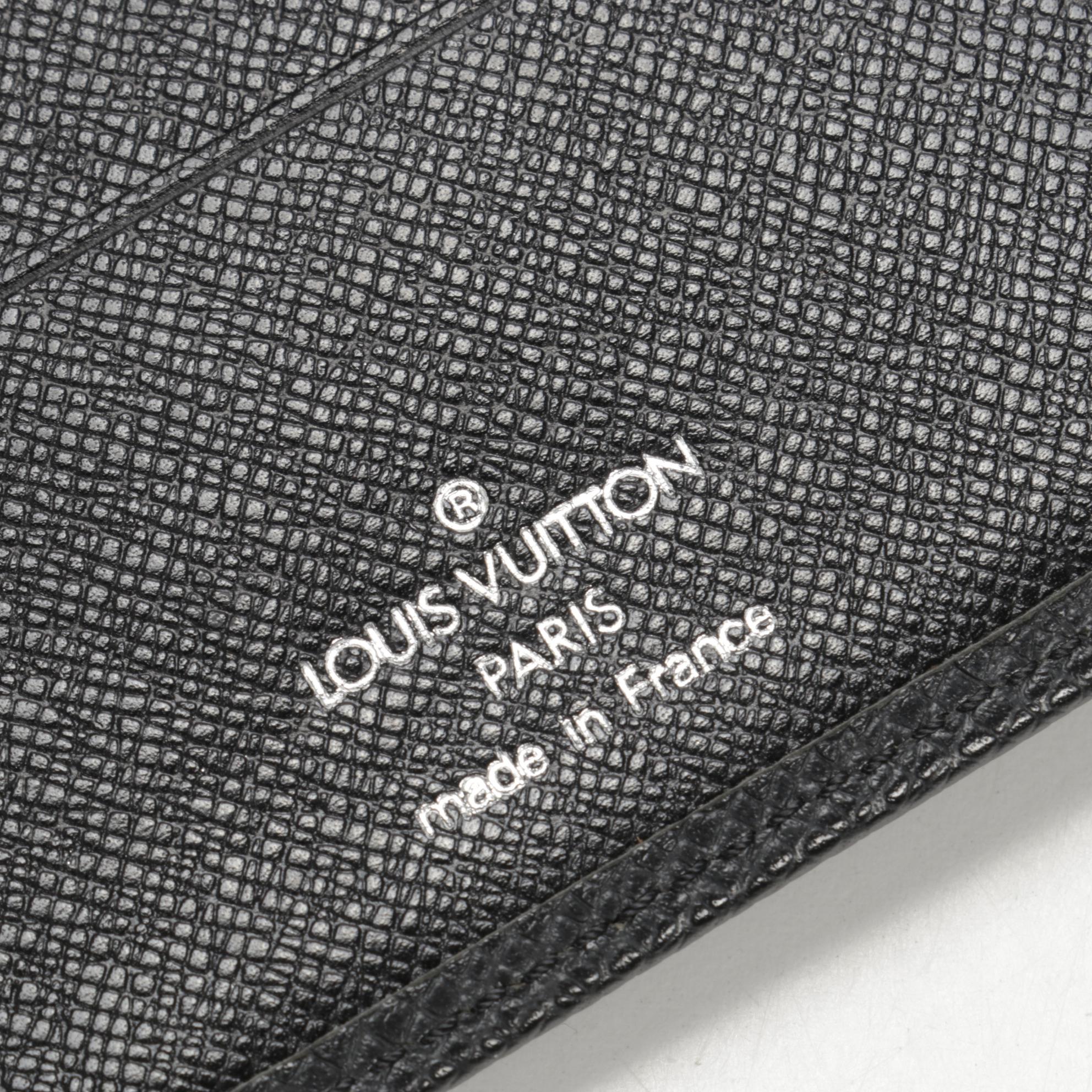 Louis Vuitton Passport Holder in Black Taiga Leather