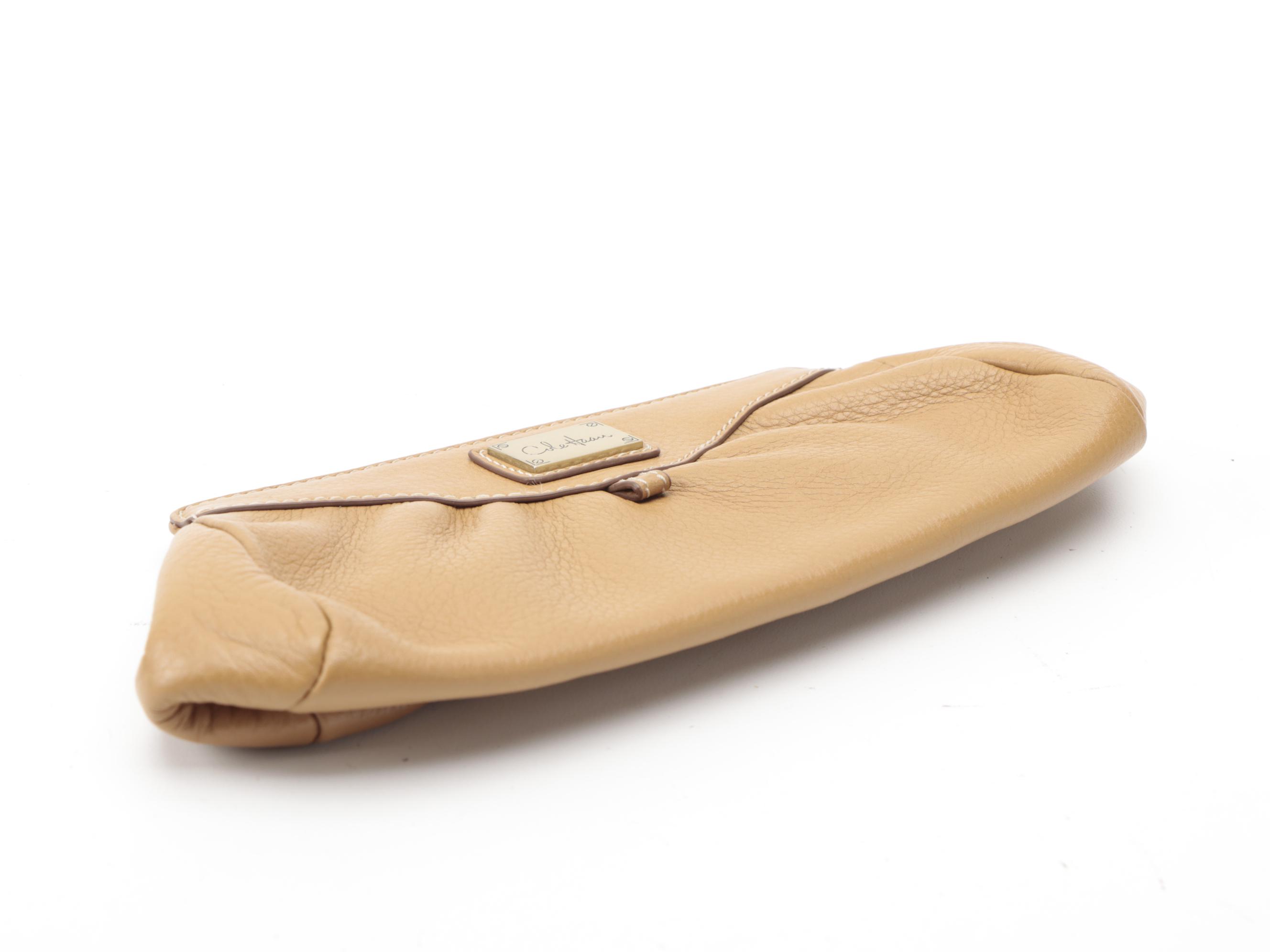 Cole Haan Leather Clutch, Inge Christopher Clutch Purse, and Tory Burch Wallet