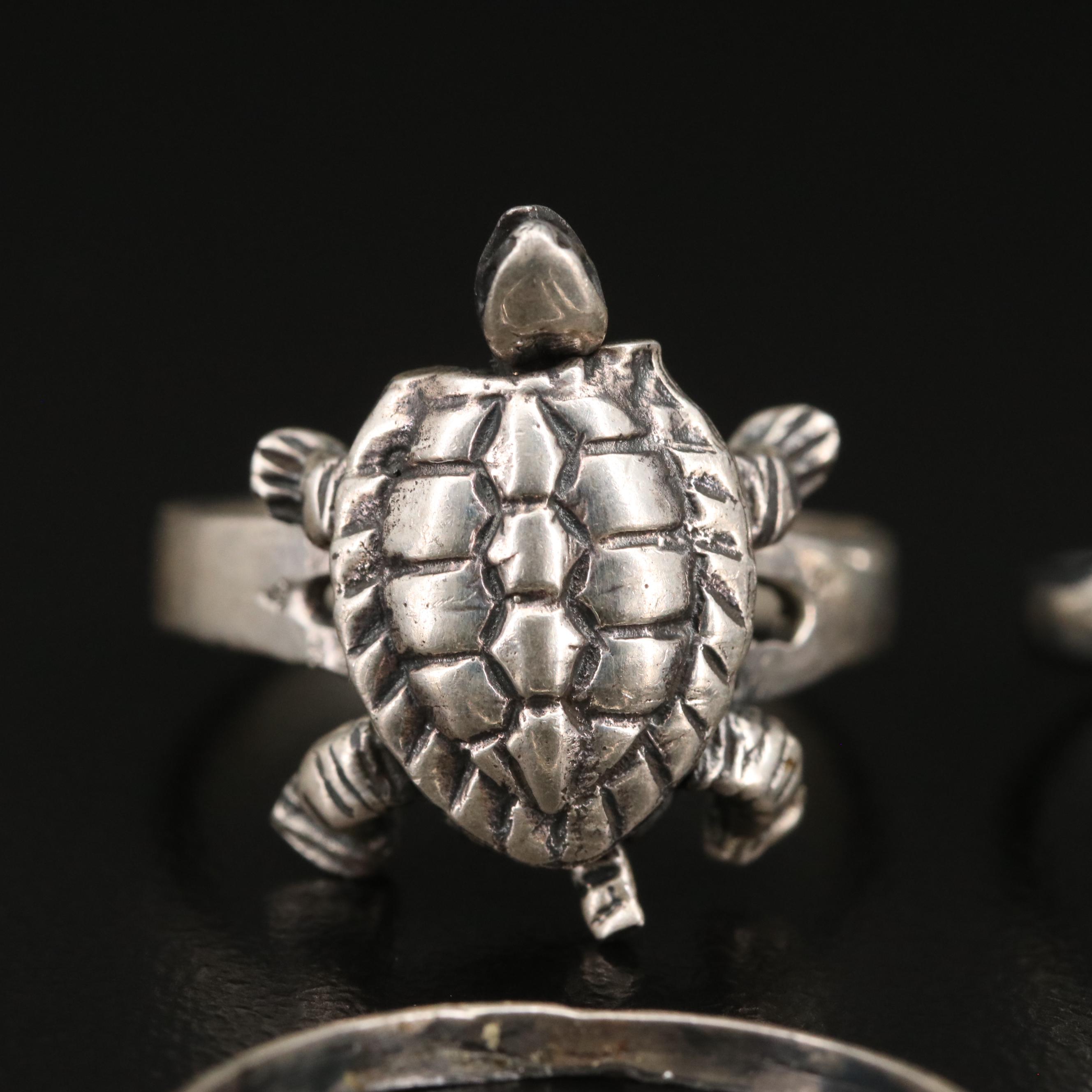 Sterling Articulated Turtle, Tibetan Varja and Sun/Moon Stacking Rings
