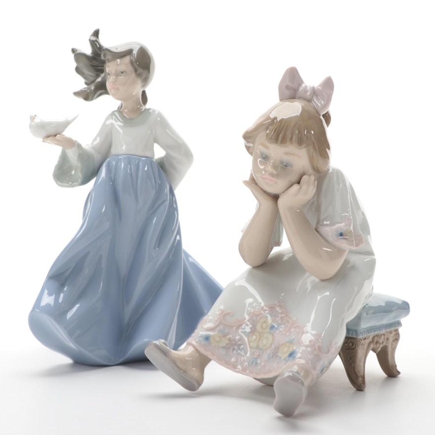 Lladró "Nothing to Do" with Nao by Lladró "Winged Friend" Porcelain Figurines