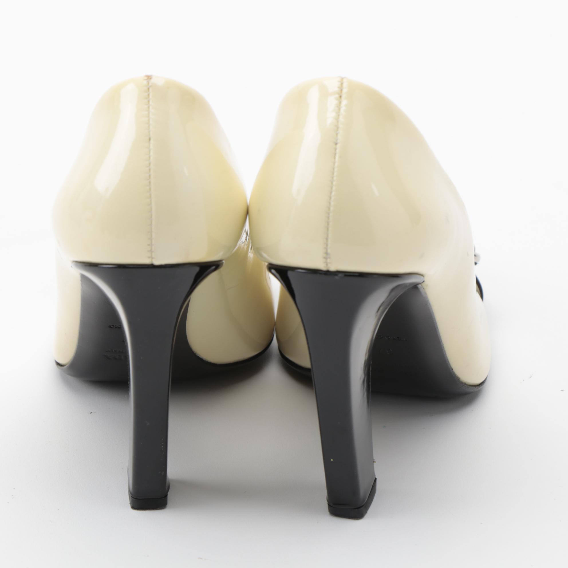 Prada Black and Pearlized Ivory Patent Leather Pumps