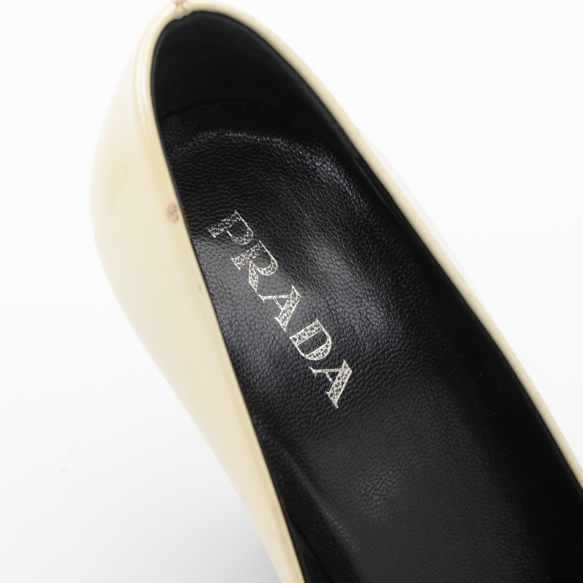 Prada Black and Pearlized Ivory Patent Leather Pumps