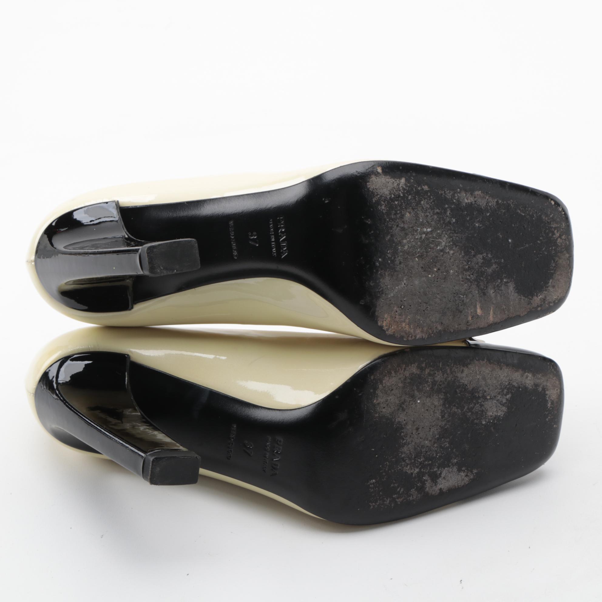 Prada Black and Pearlized Ivory Patent Leather Pumps