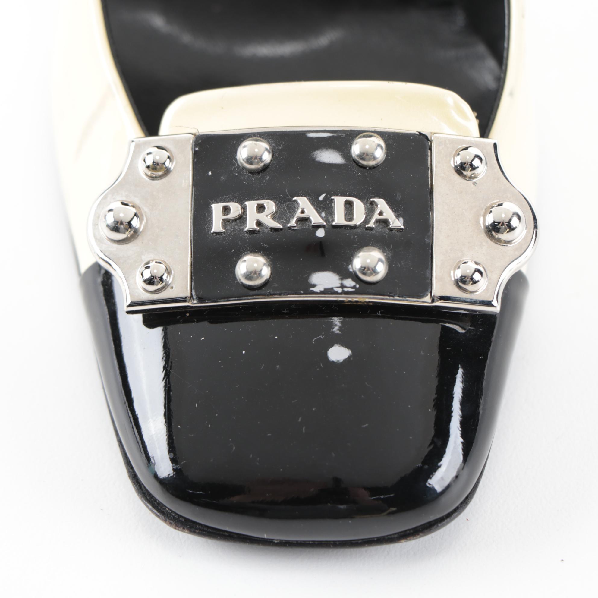 Prada Black and Pearlized Ivory Patent Leather Pumps