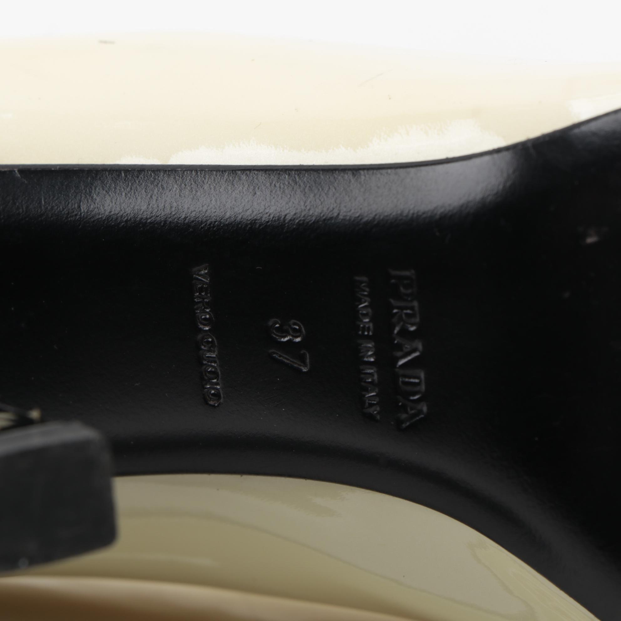 Prada Black and Pearlized Ivory Patent Leather Pumps