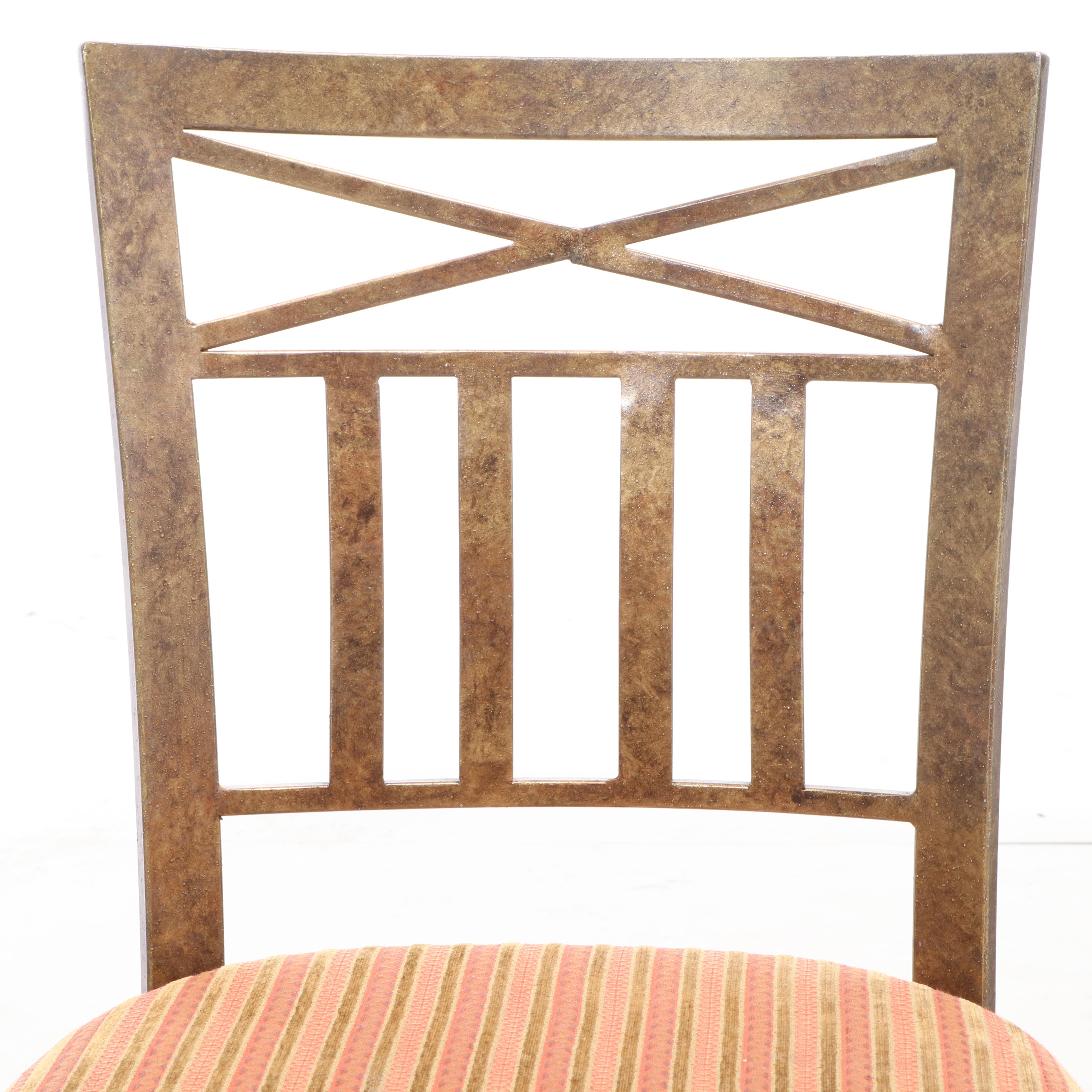 Three Kessler Industries Patinated Metal Counter-Height Swivel Bar Stools