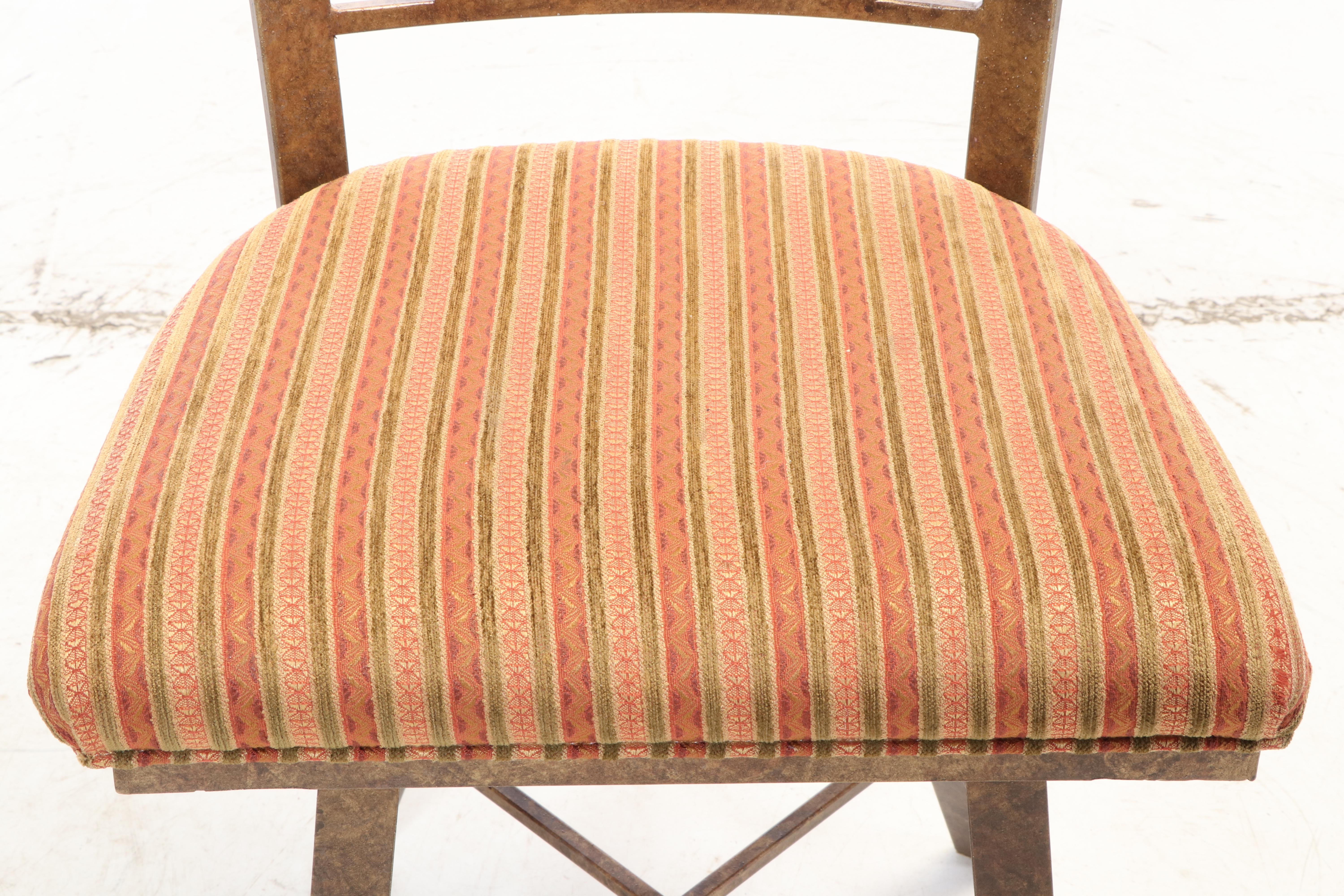 Three Kessler Industries Patinated Metal Counter-Height Swivel Bar Stools