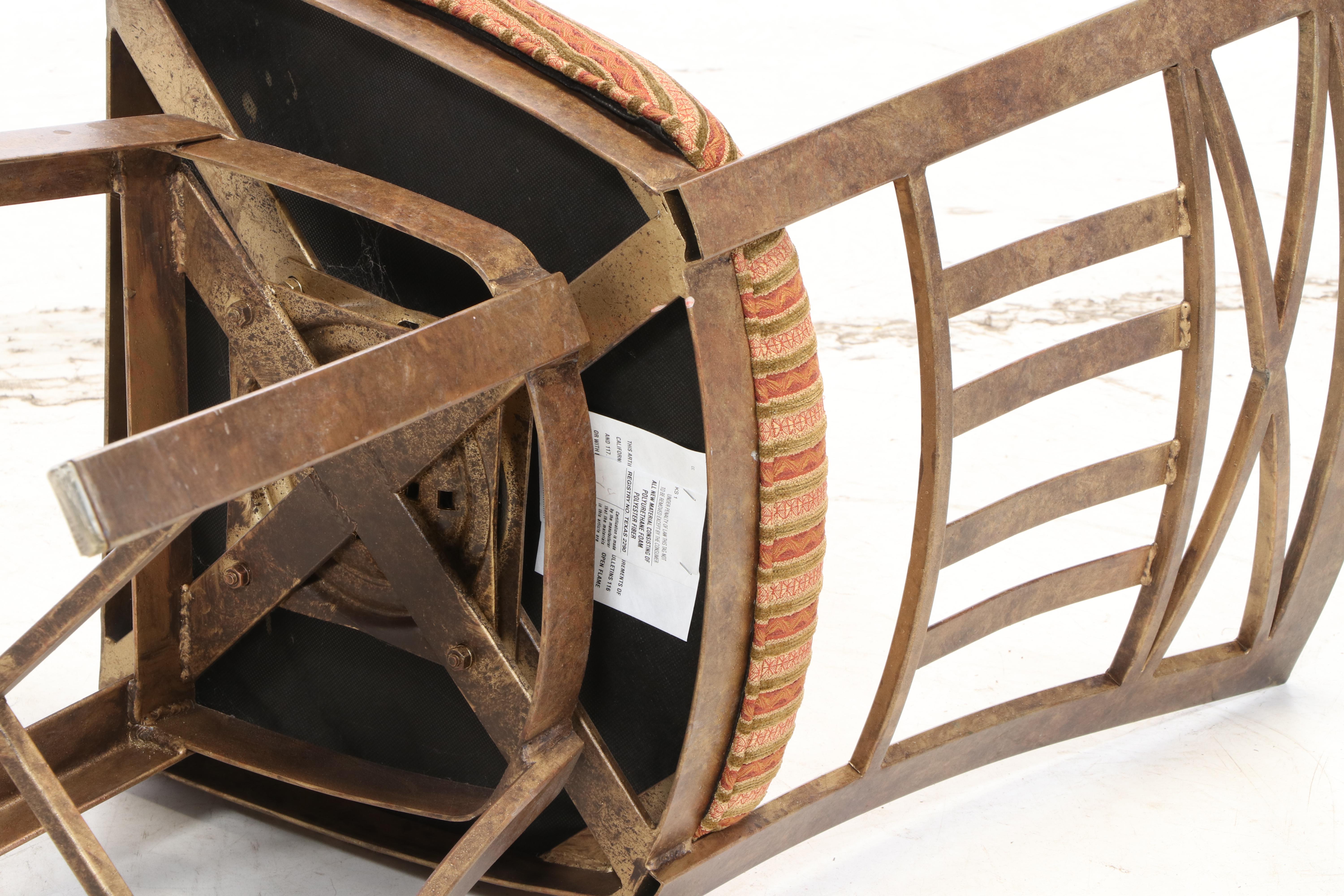 Three Kessler Industries Patinated Metal Counter-Height Swivel Bar Stools