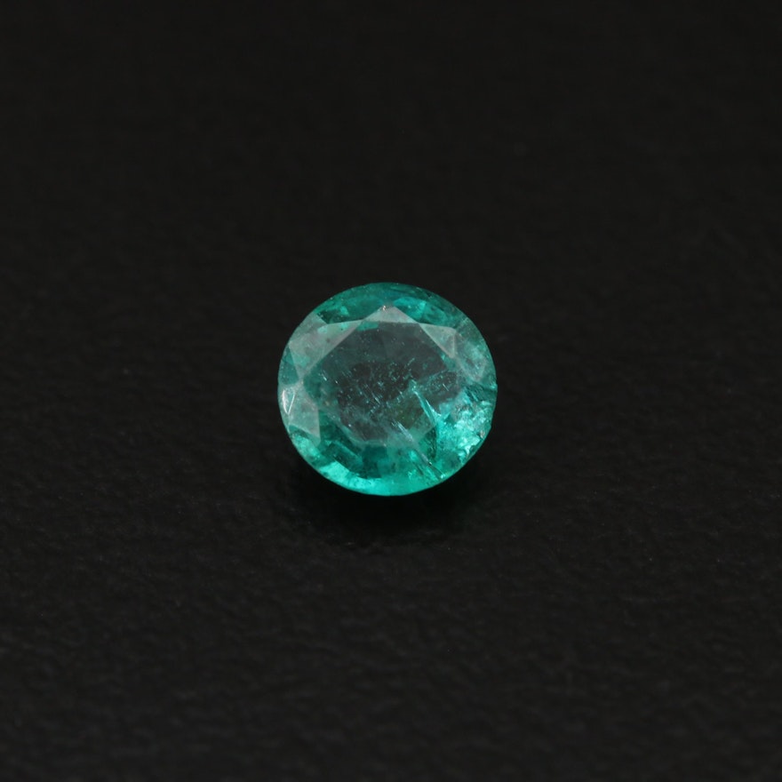 Loose 0.59 CT Round Faceted Emerald