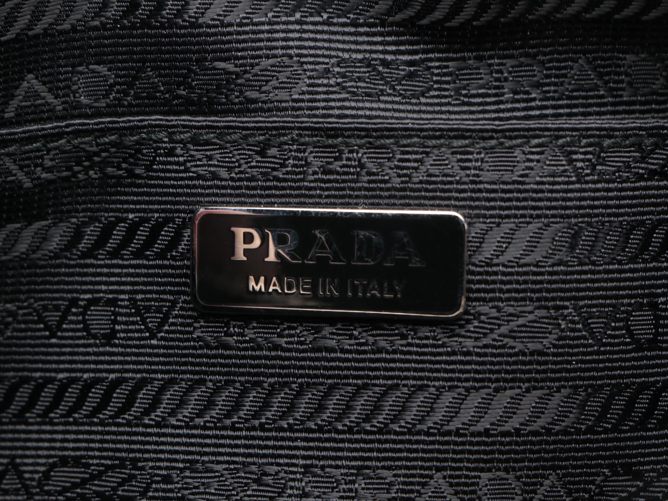 Prada Brown Leather Comic Logo Zipper Clutch