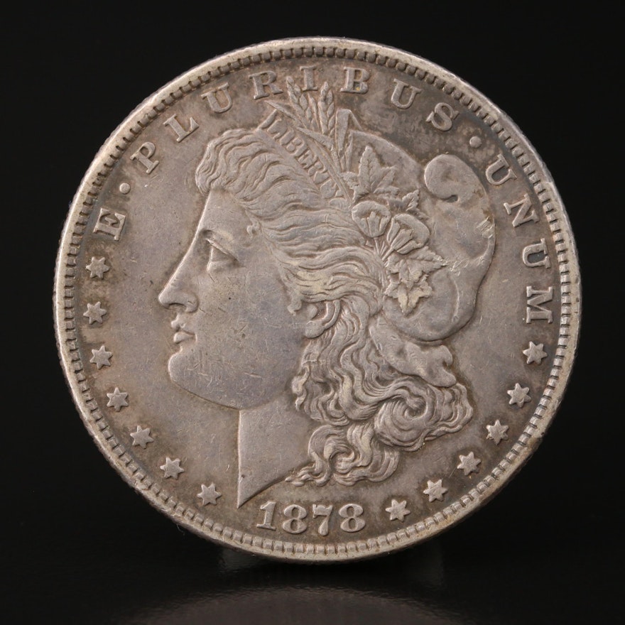 Toned 1878 7 Tail Feathers Morgan Silver Dollar