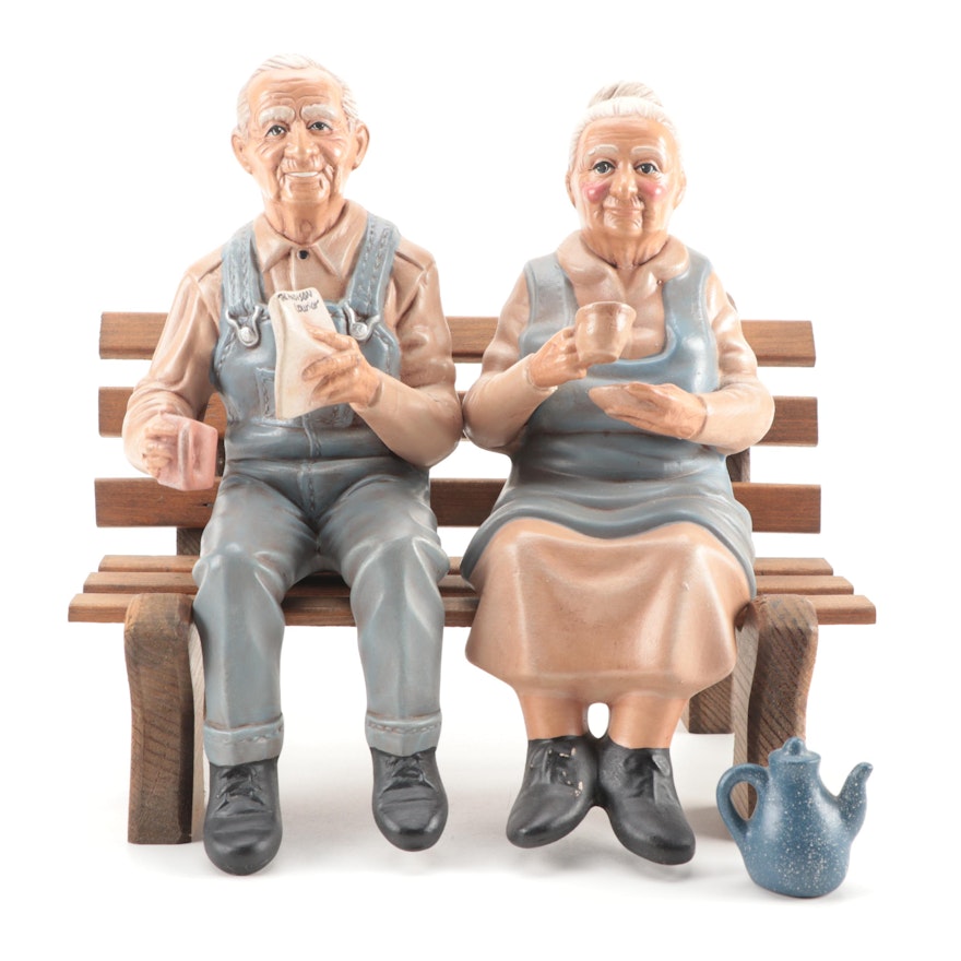 Hershey  Seated Couple Figurines on Wooden Bench