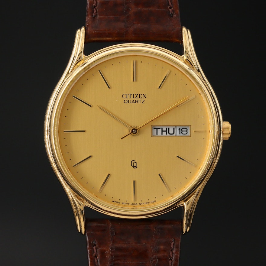 Vintage Citizen CQ Day-Date Gold Tone Quartz Wristwatch