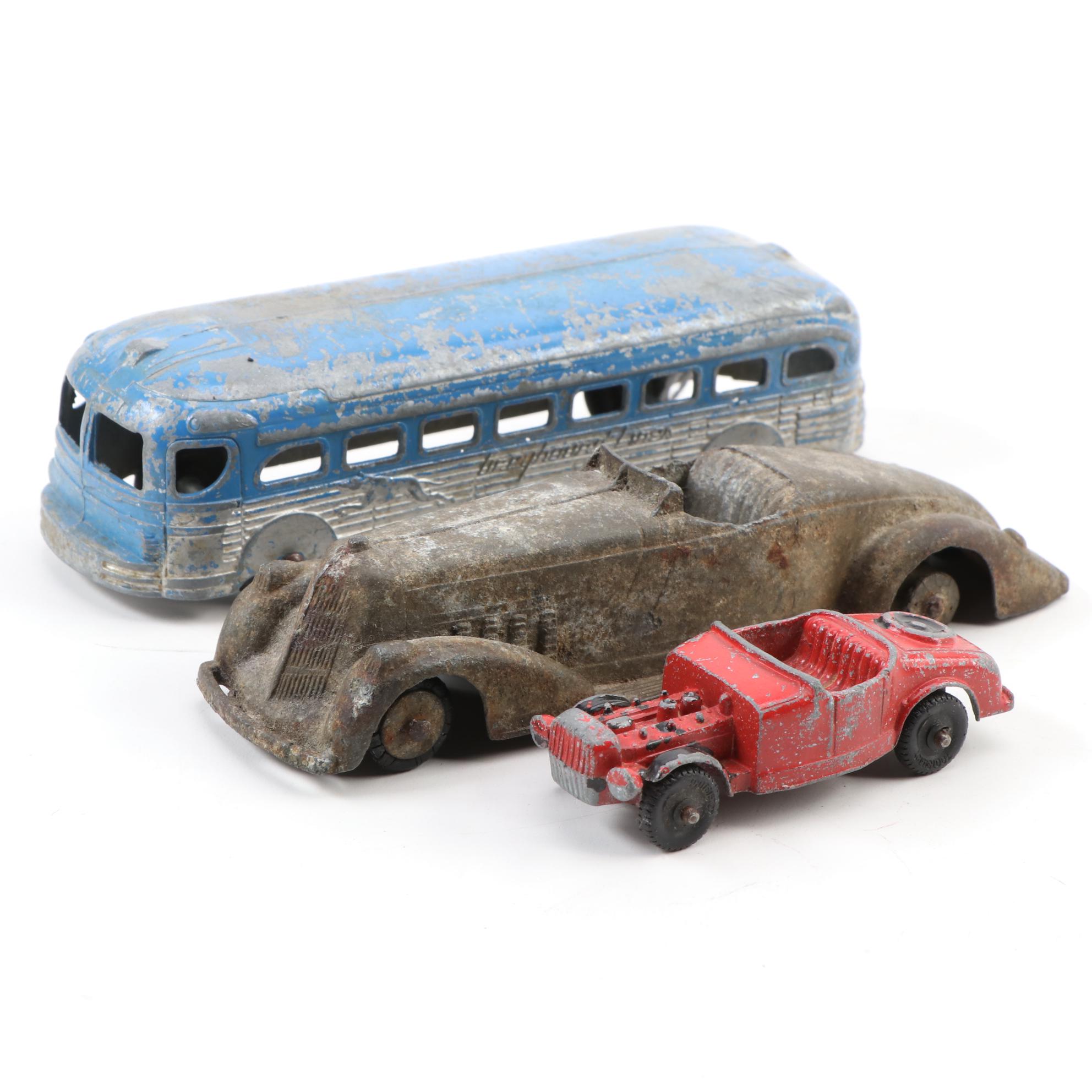 Tootsietoy Cast Metal "Greyhound" Bus and Other Toy Model Cars, circa 1930
