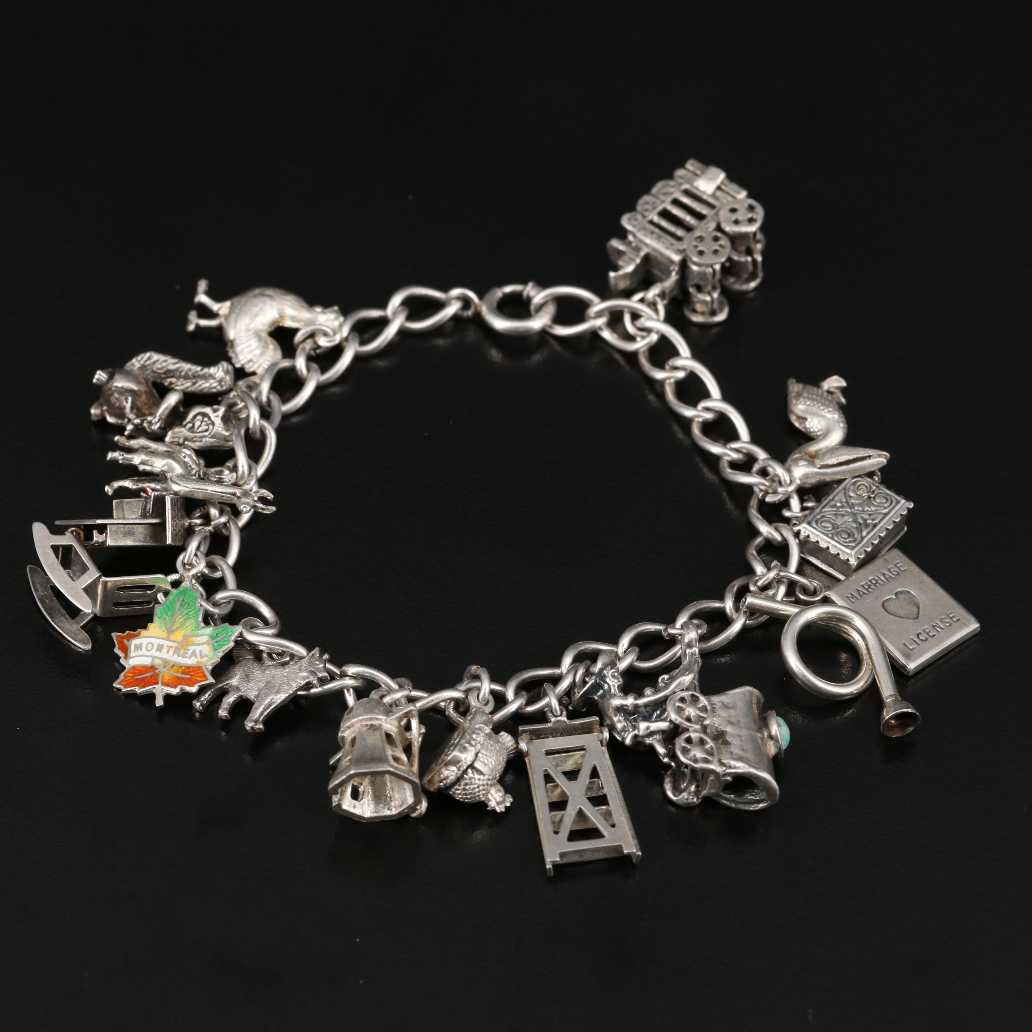 Vintage Sterling Charm Bracelet Including Articulation, Enamel and Turquoise